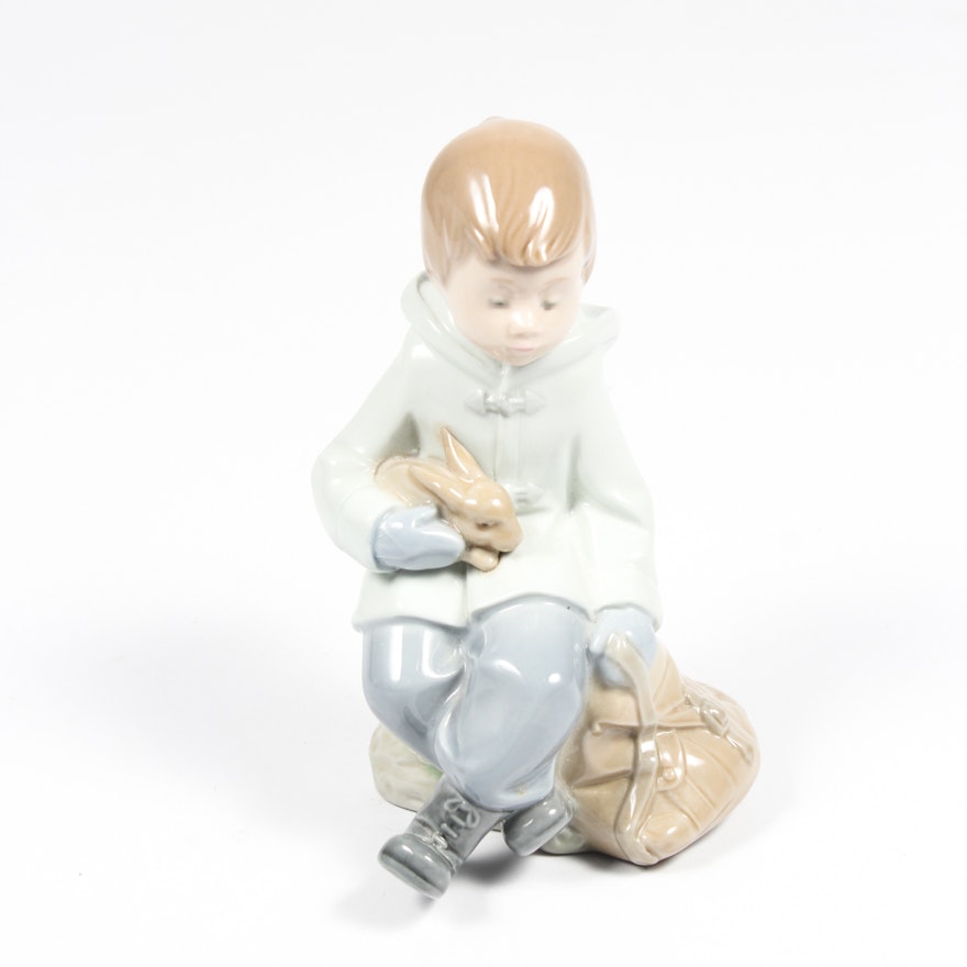 Nao by Lladó Porcelain Figurine of a Boy Holding a Bunny