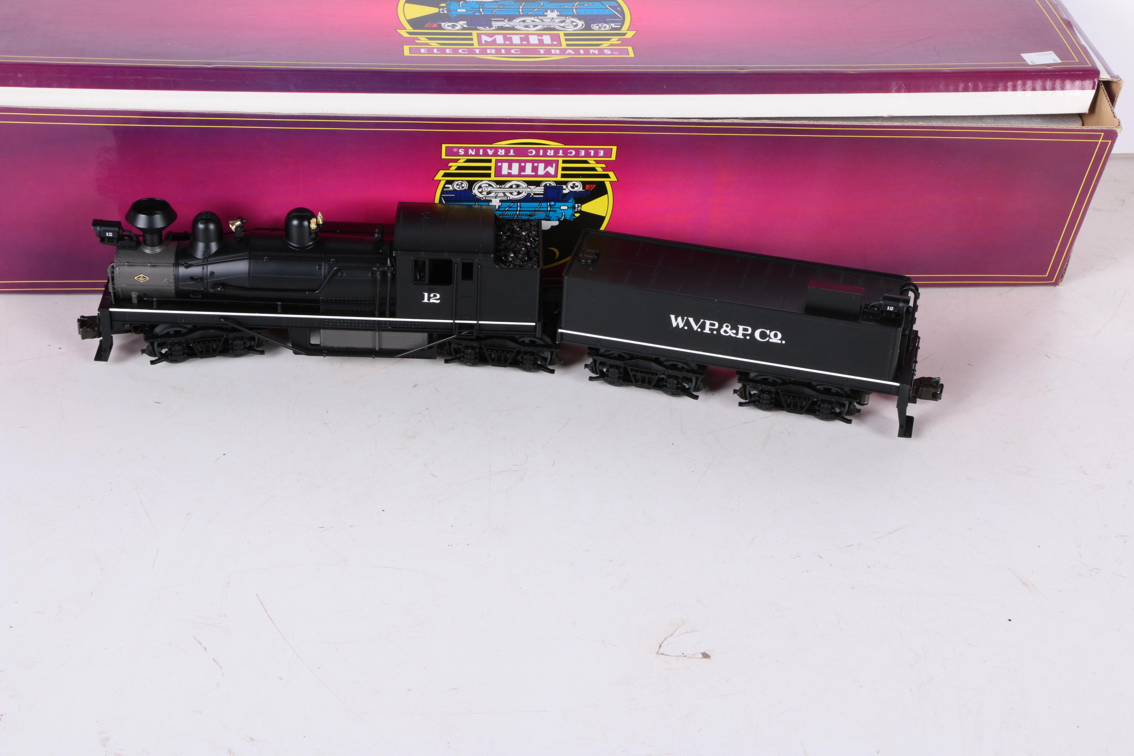 M.T.H. Electric O Scale 2 Rail Steam Engine and Lionel Southern T.T.U.X. Cars