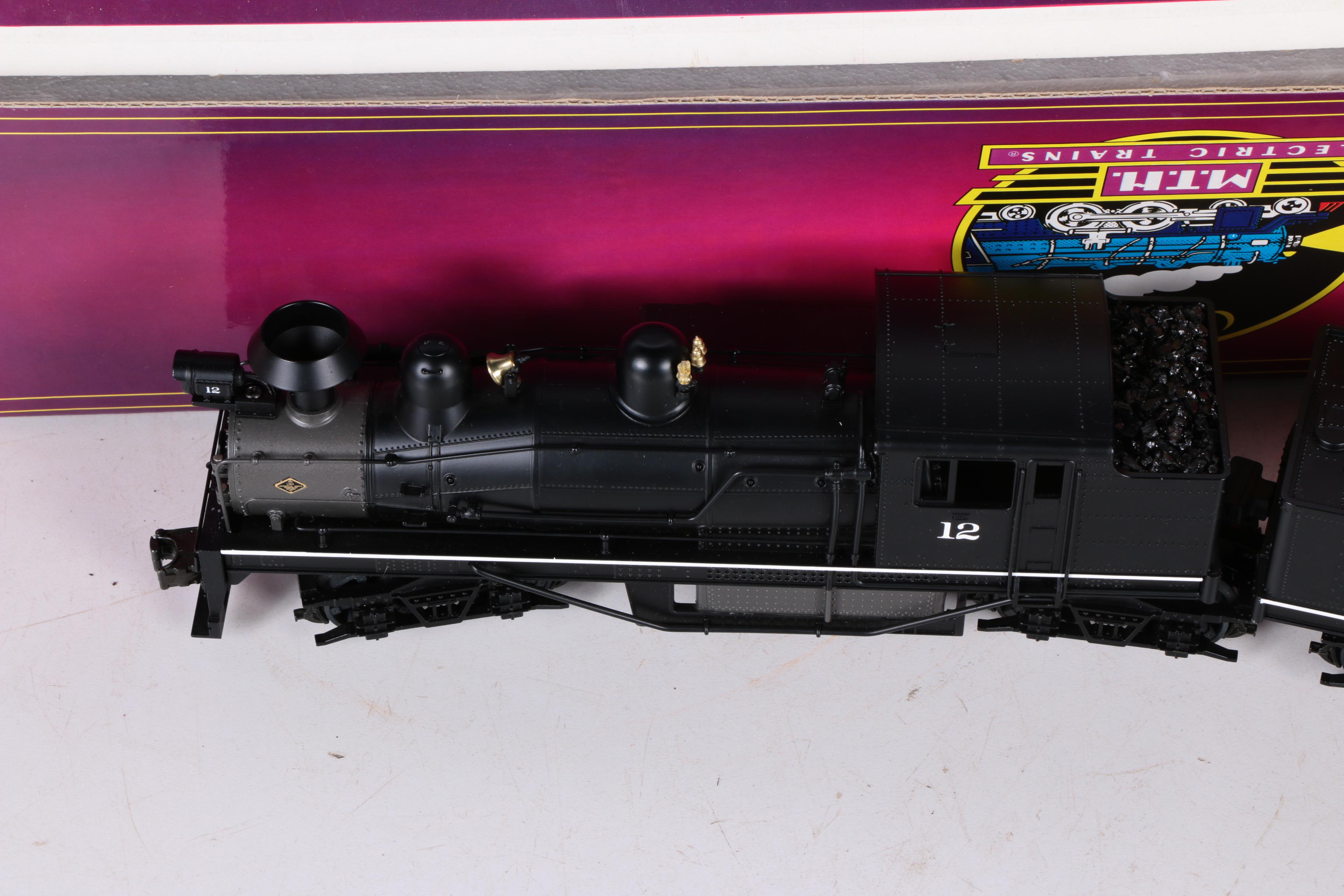 M.T.H. Electric O Scale 2 Rail Steam Engine and Lionel Southern T.T.U.X. Cars