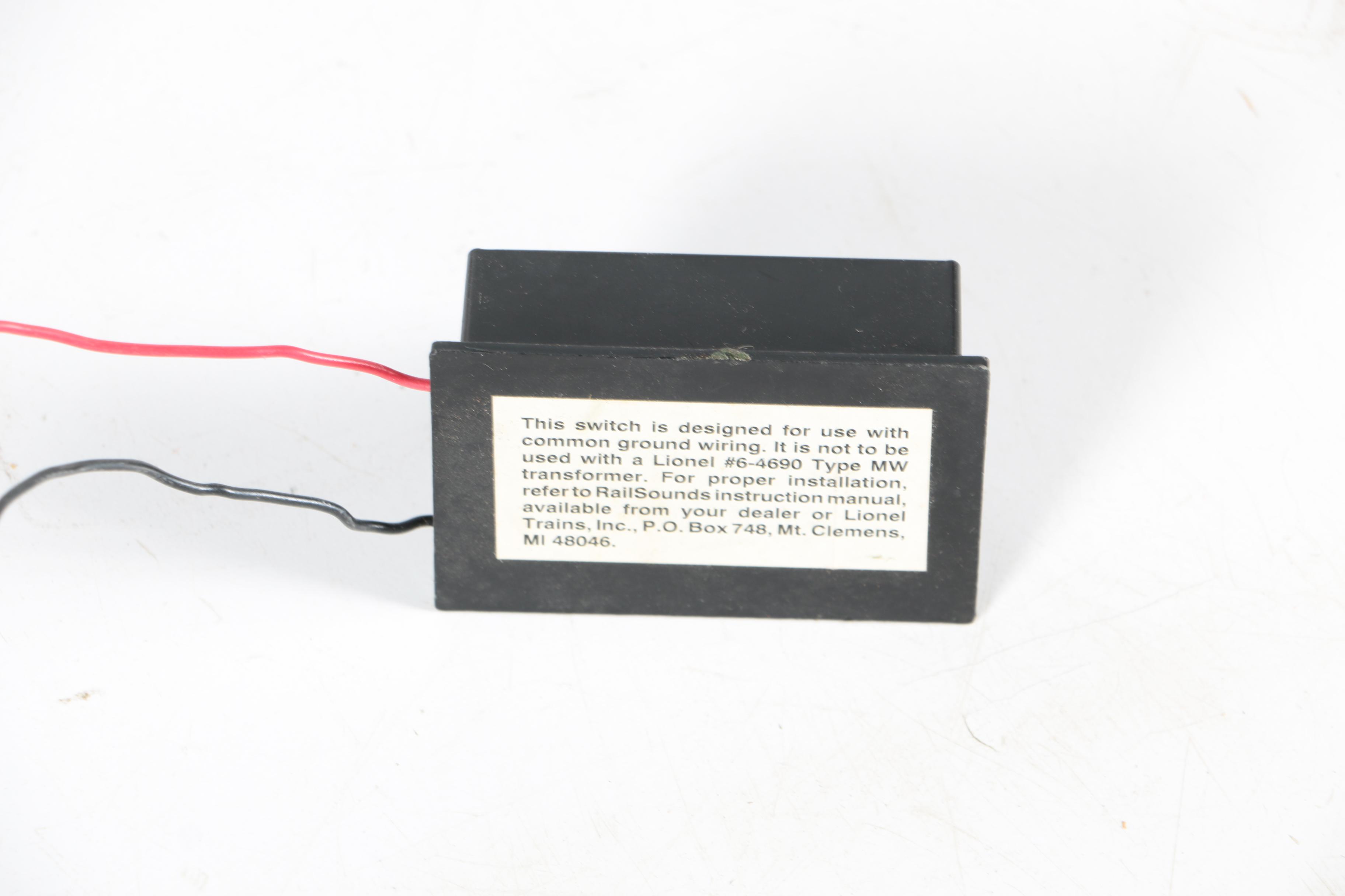 Train Set Accessories Including Lionel and Photograph