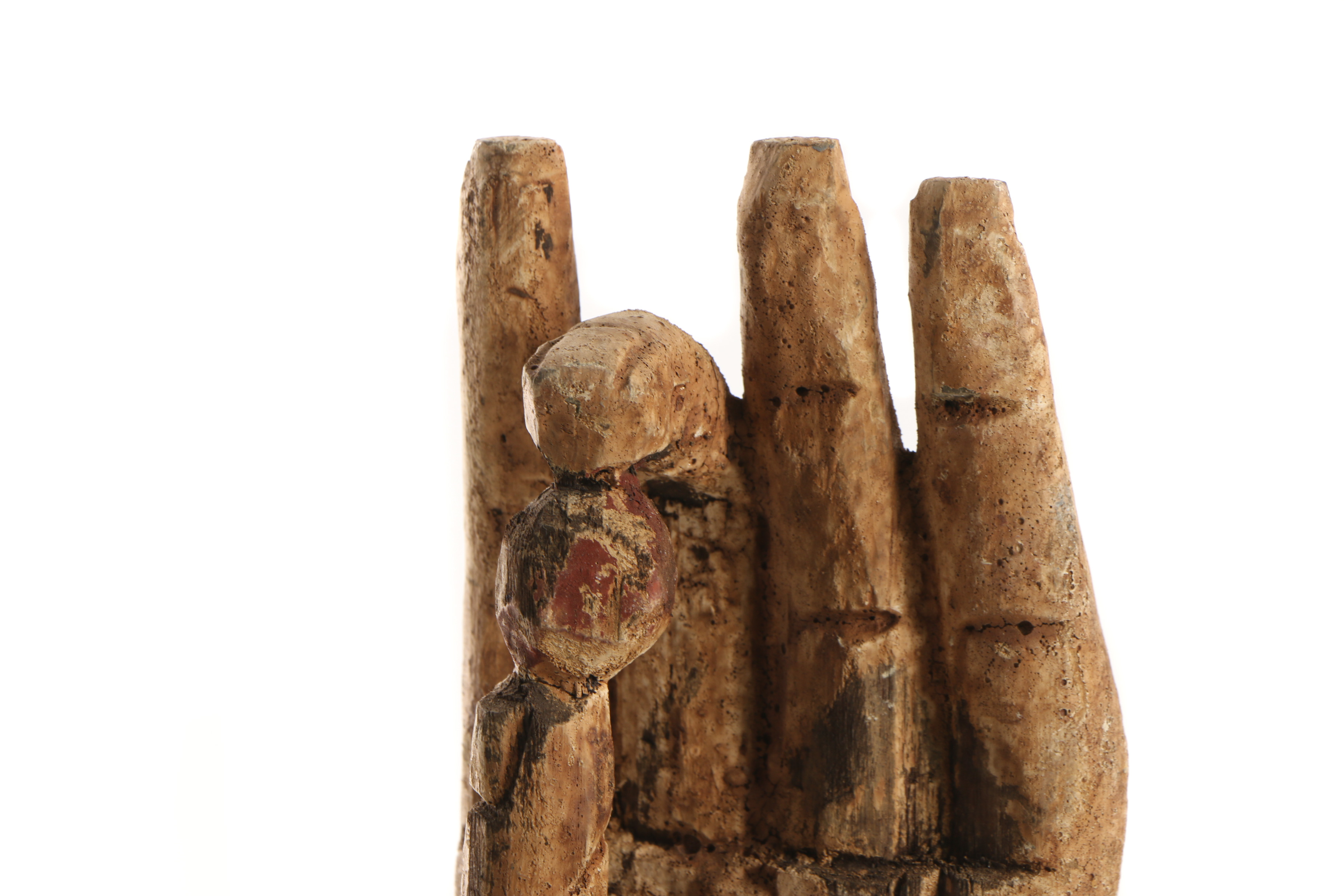 Hand-Carved Wooden Hand Holding a Pearl