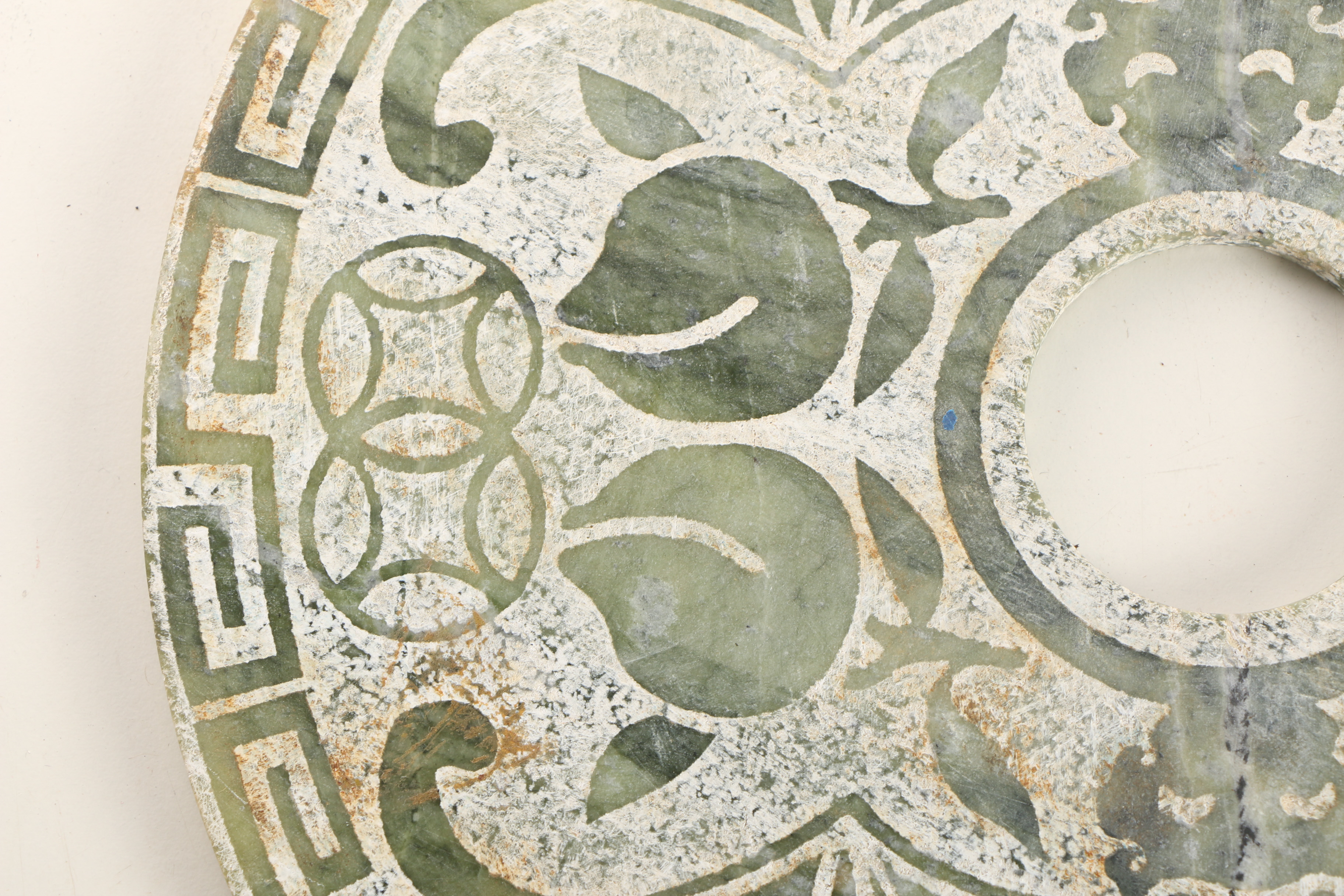 Carved Serpentine Disc