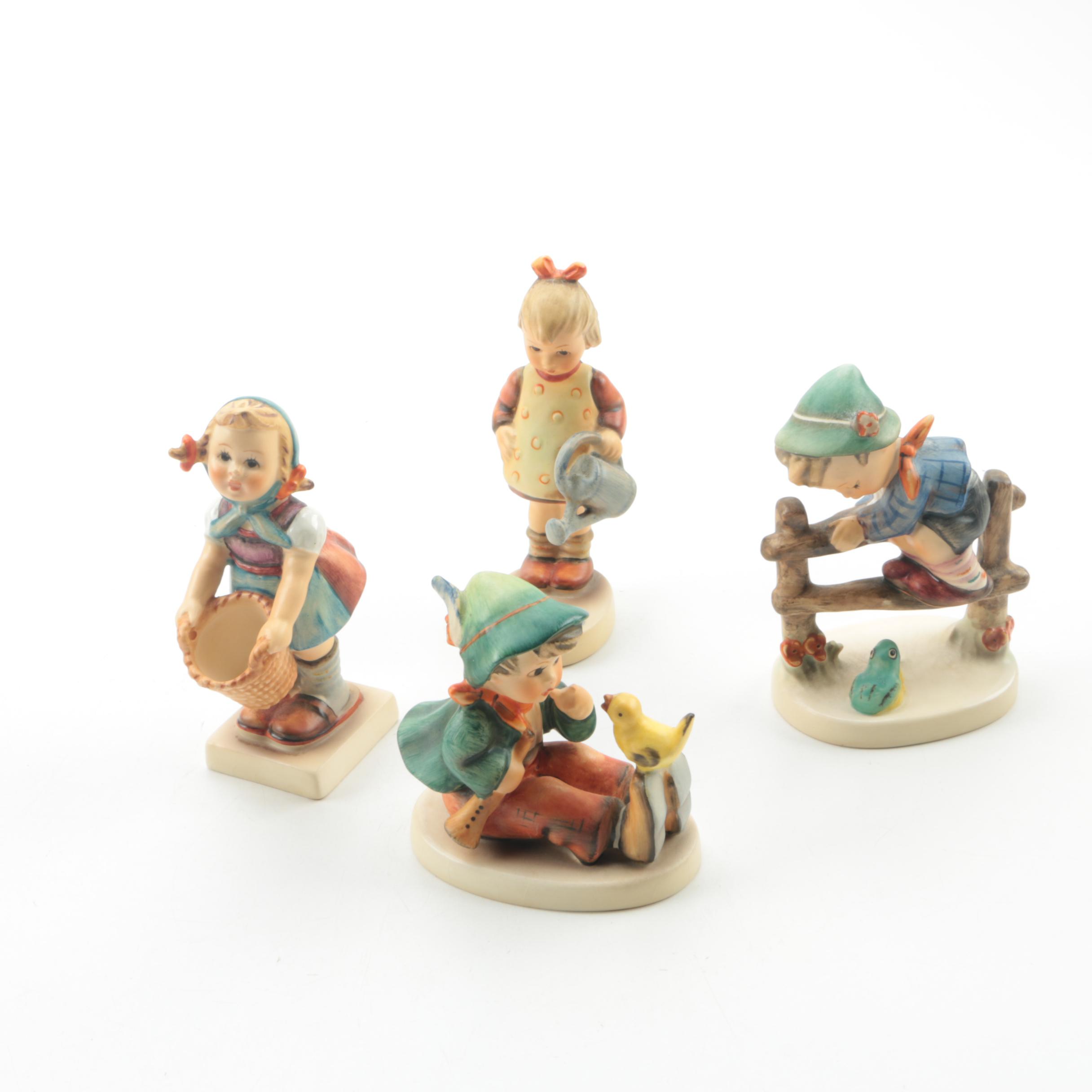 Hummel Figurines Including "Little Gardener" and "Singing Lesson"