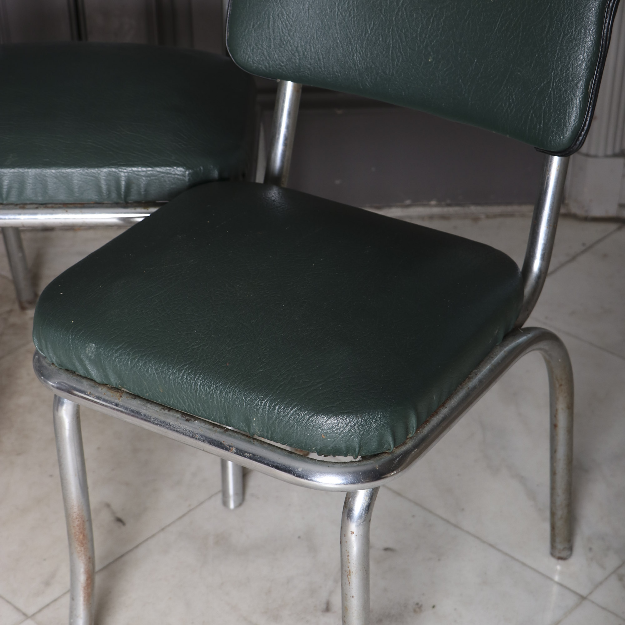 Four 1950s Chrome and Vinyl Chairs