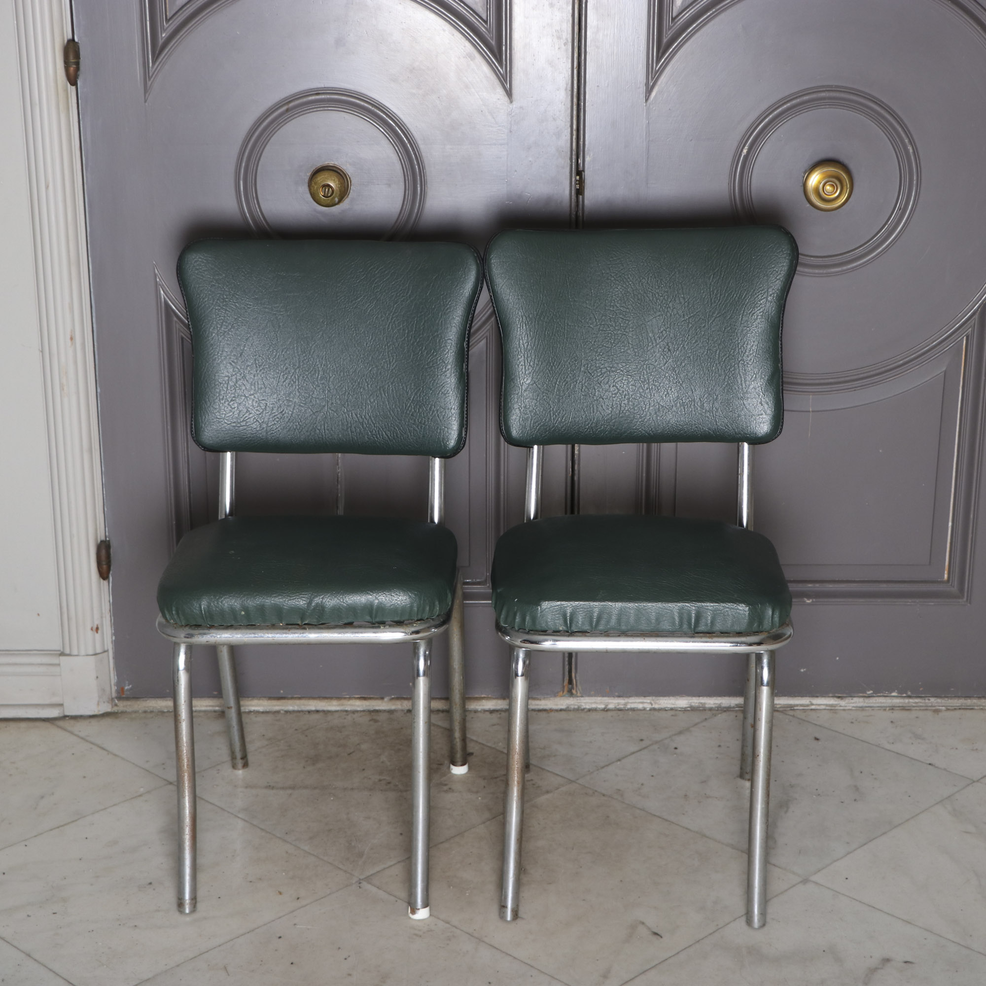 Four 1950s Chrome and Vinyl Chairs