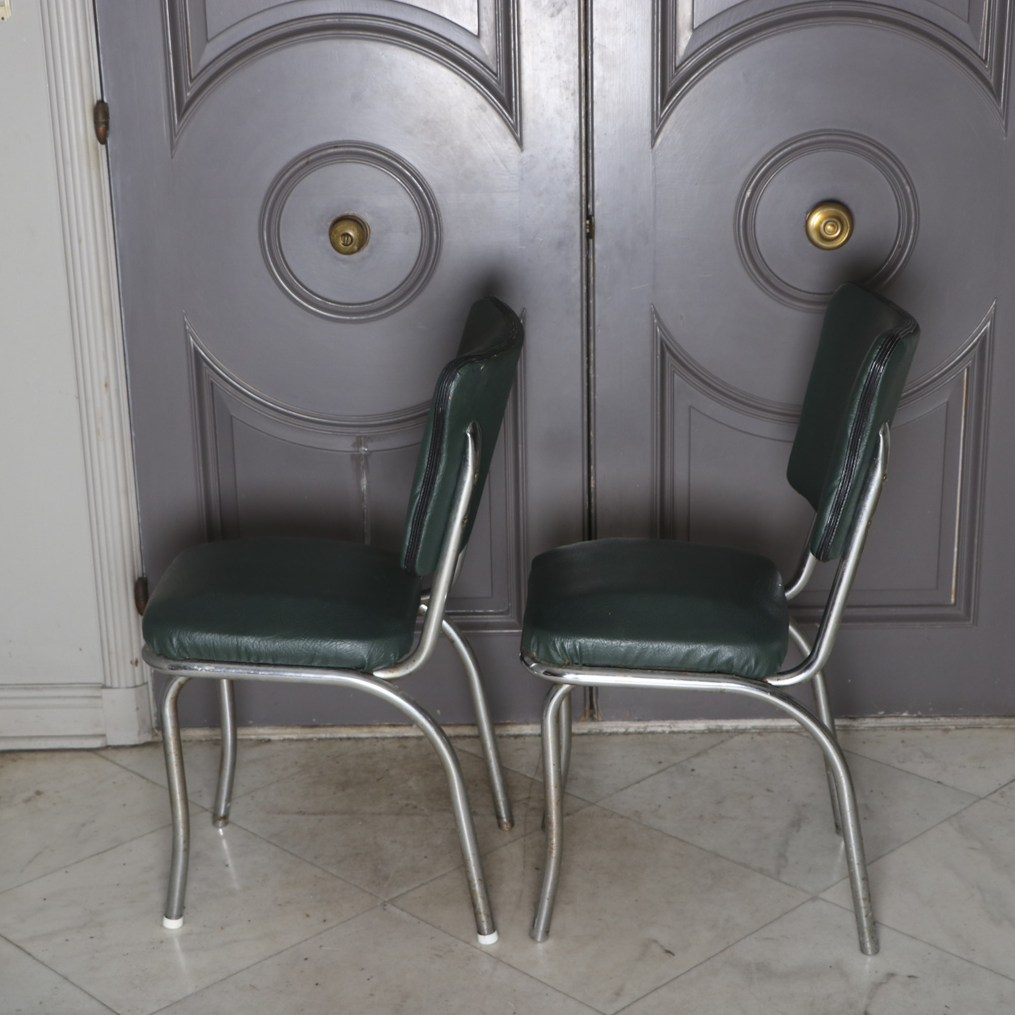 Four 1950s Chrome and Vinyl Chairs