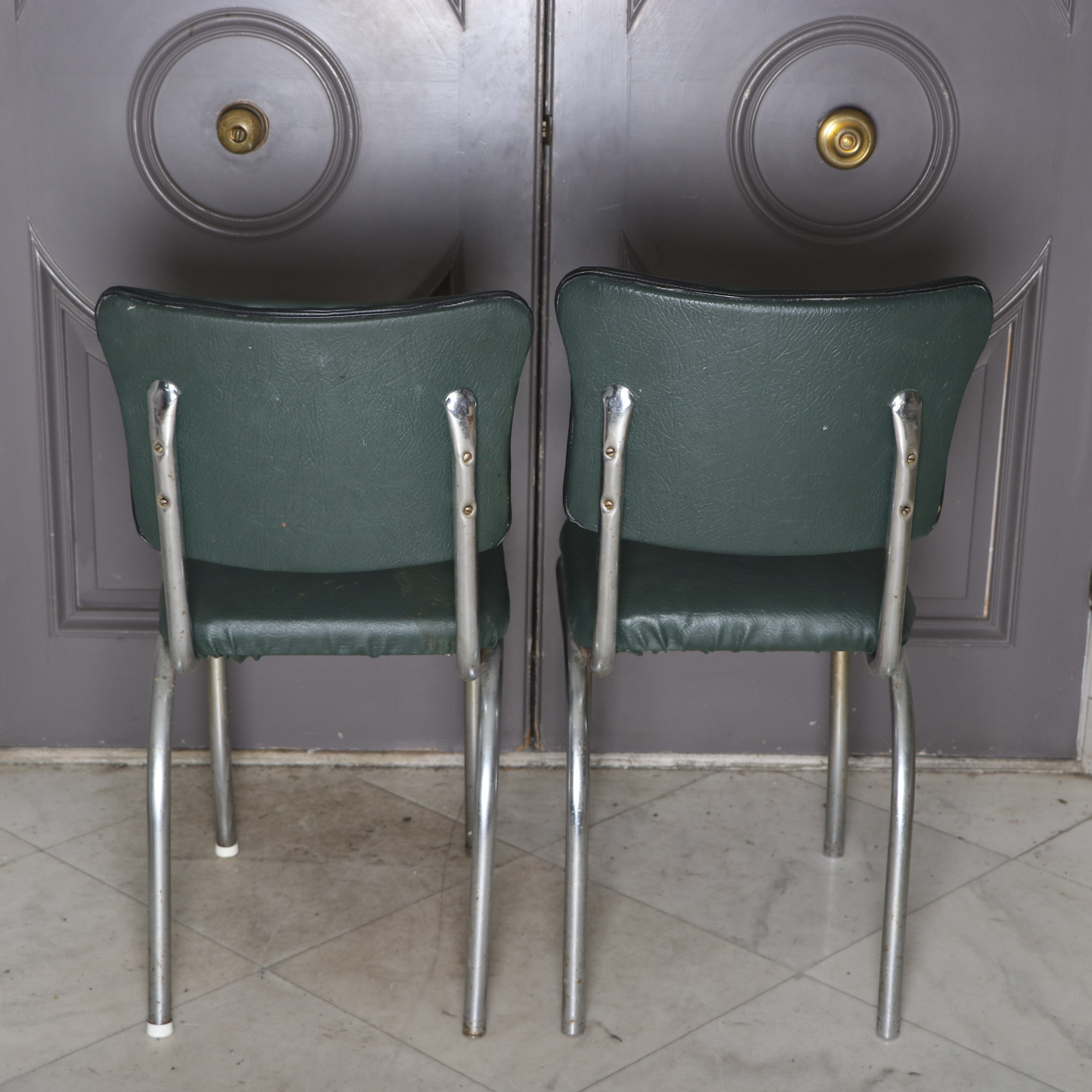 Four 1950s Chrome and Vinyl Chairs