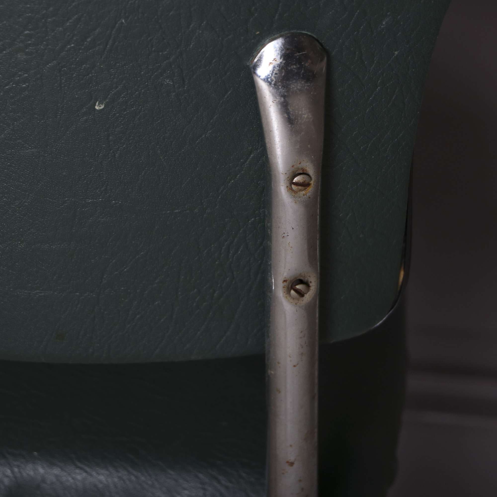 Four 1950s Chrome and Vinyl Chairs