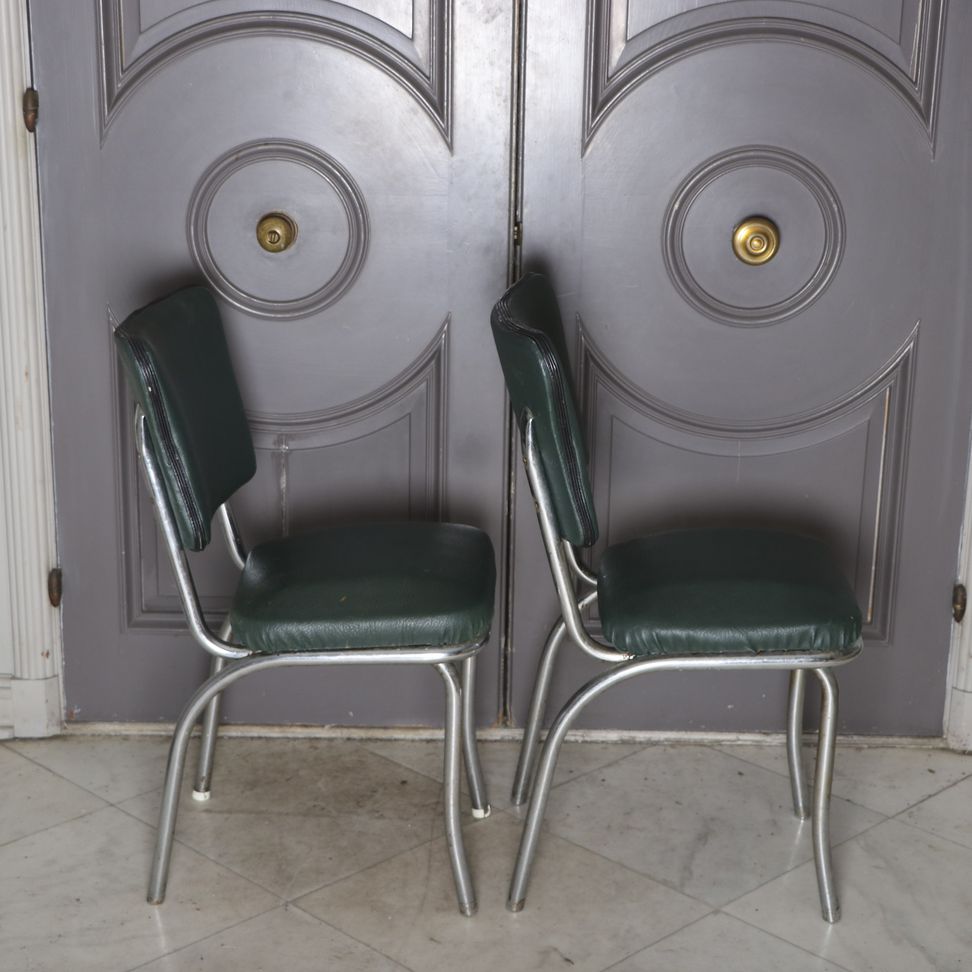 Four 1950s Chrome and Vinyl Chairs