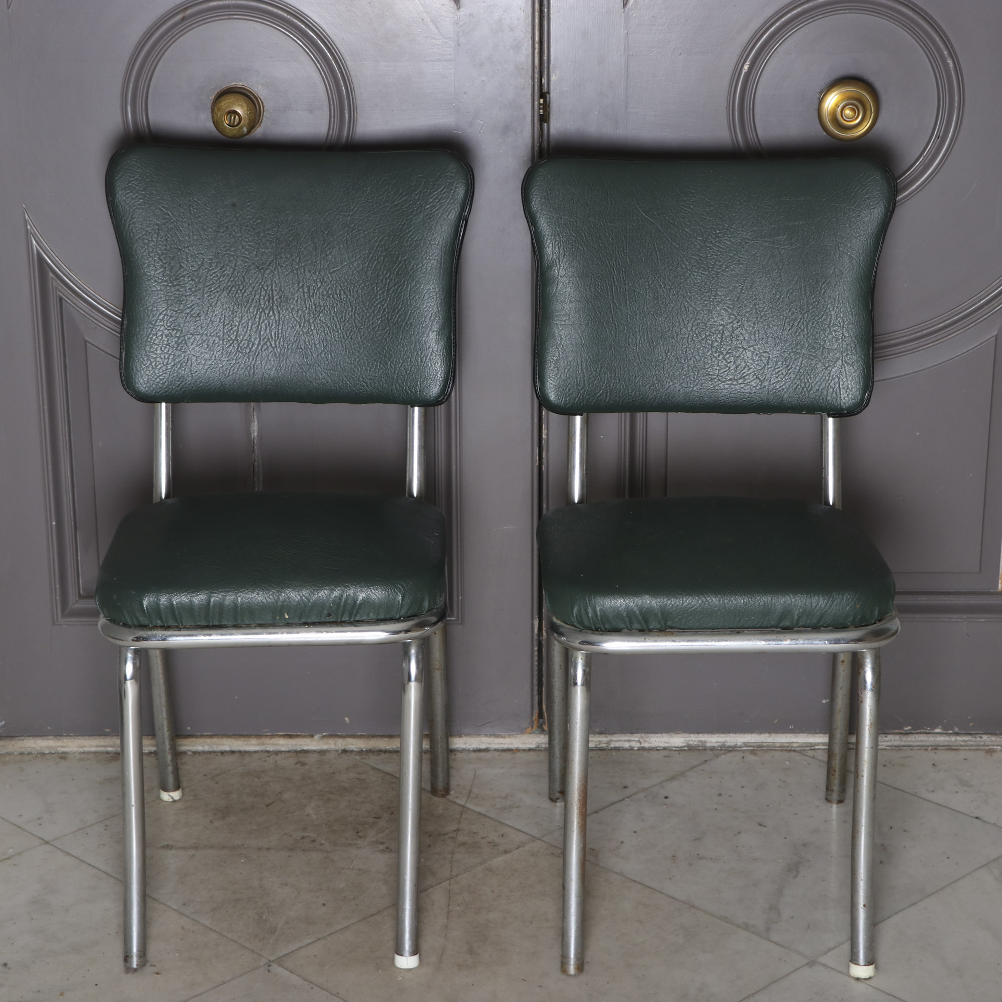 Four 1950s Chrome and Vinyl Chairs