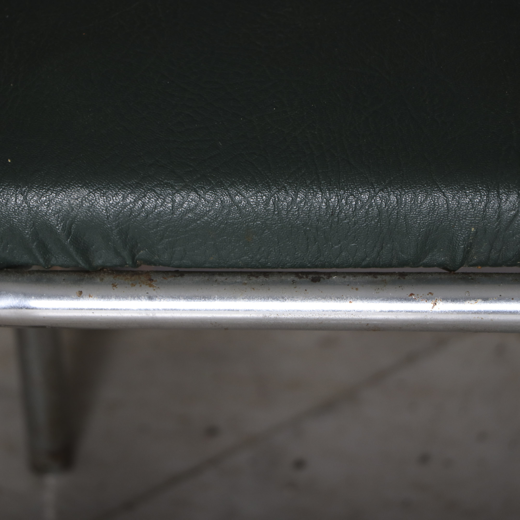 Four 1950s Chrome and Vinyl Chairs