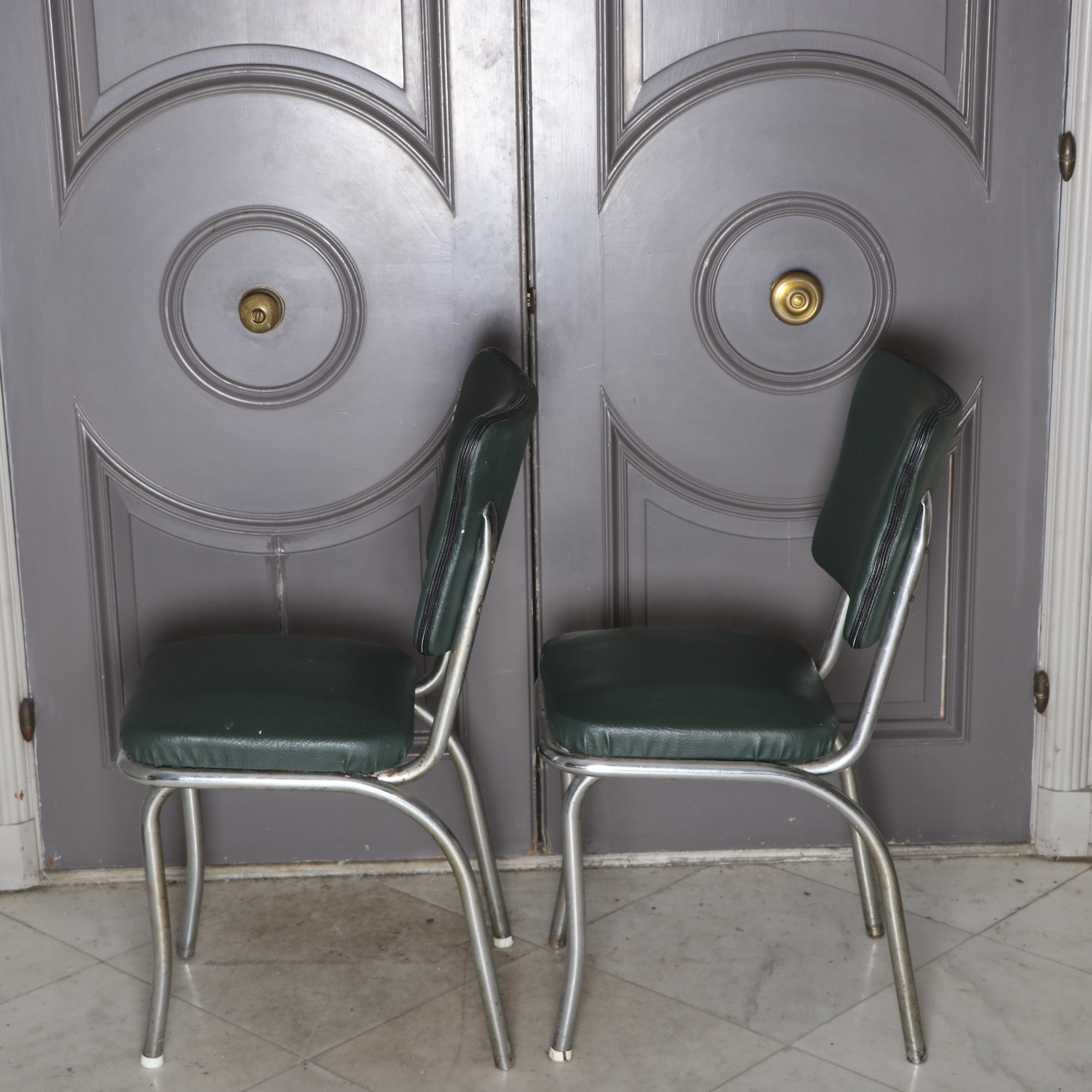 Four 1950s Chrome and Vinyl Chairs