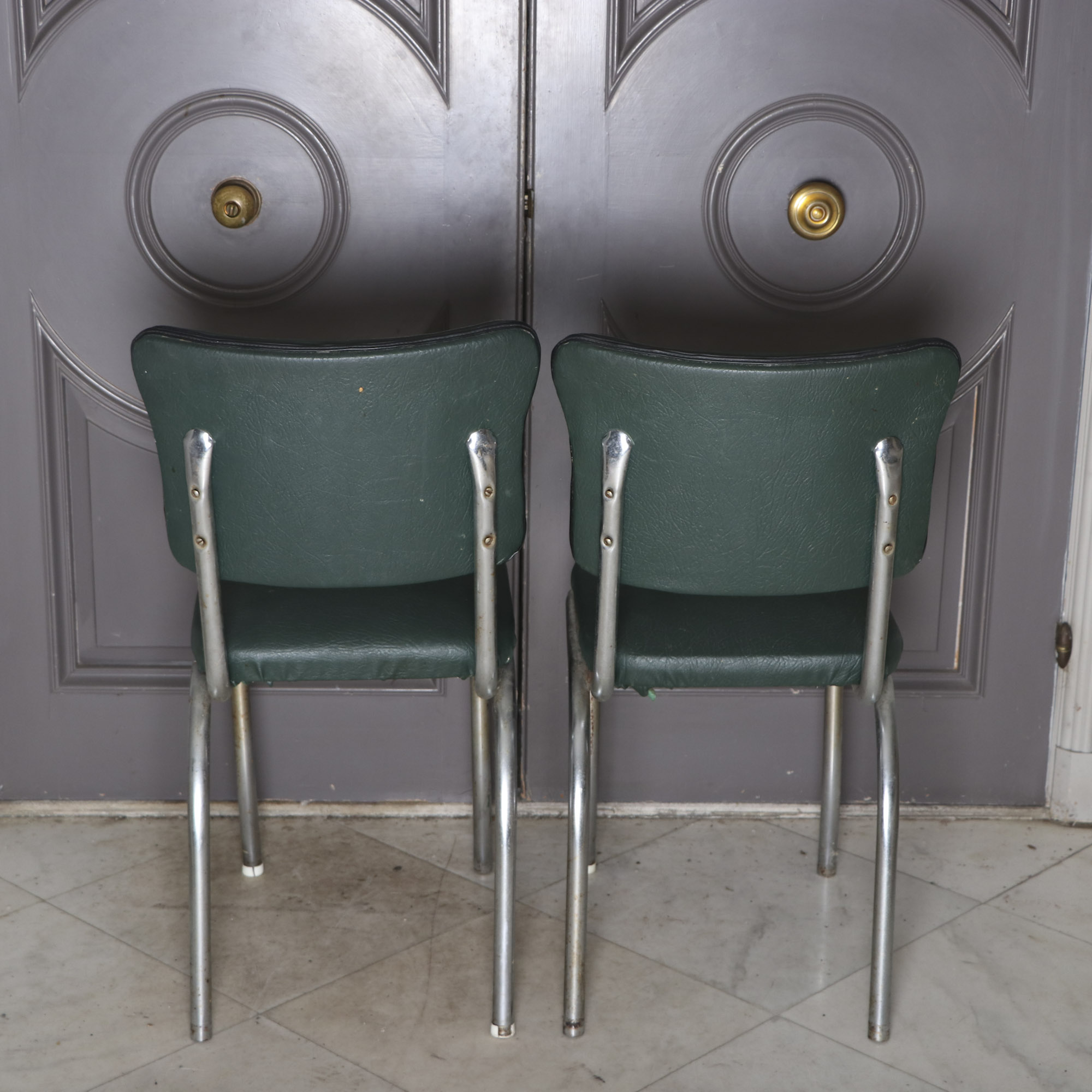 Four 1950s Chrome and Vinyl Chairs