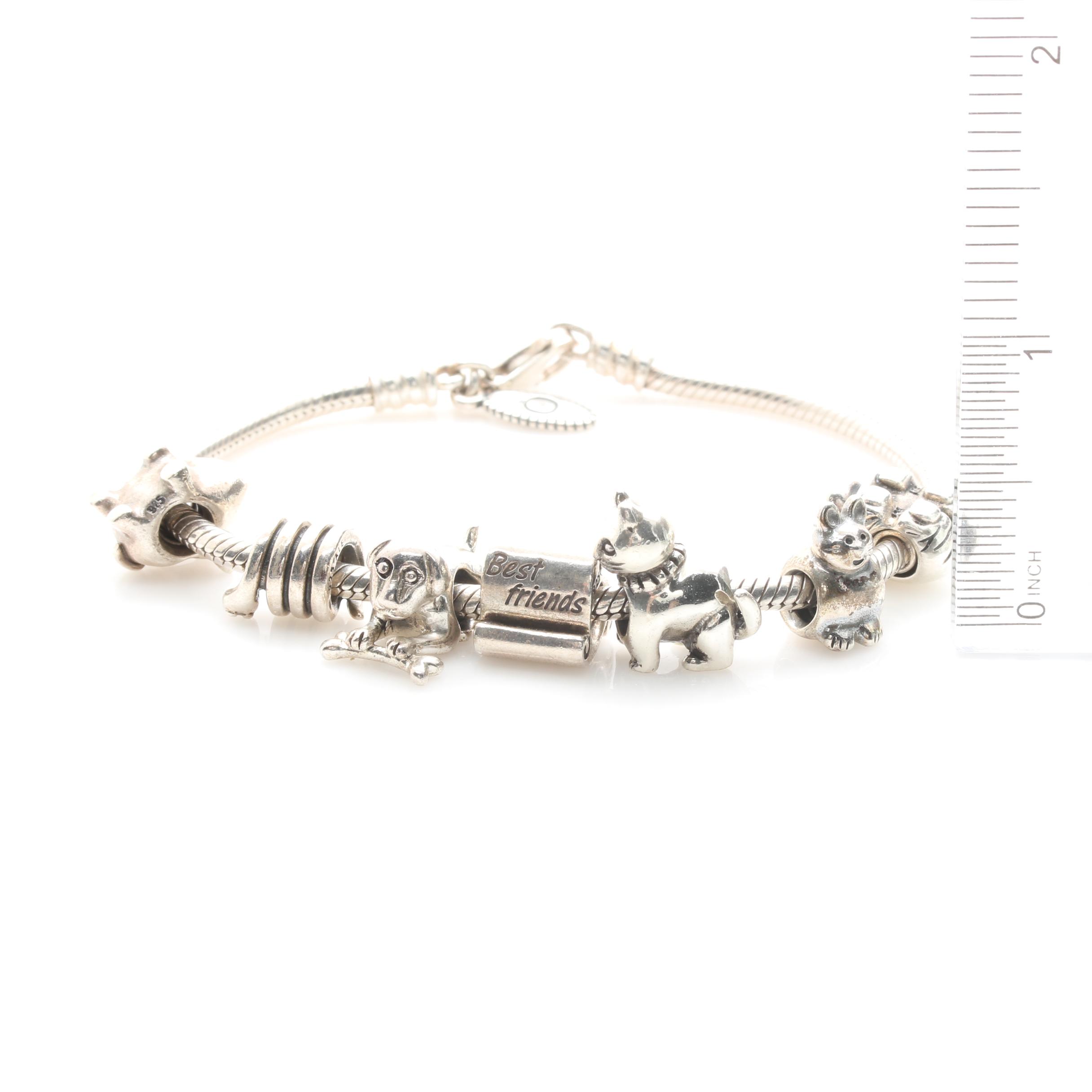 Pandora Sterling Silver Bracelet with Several Charms