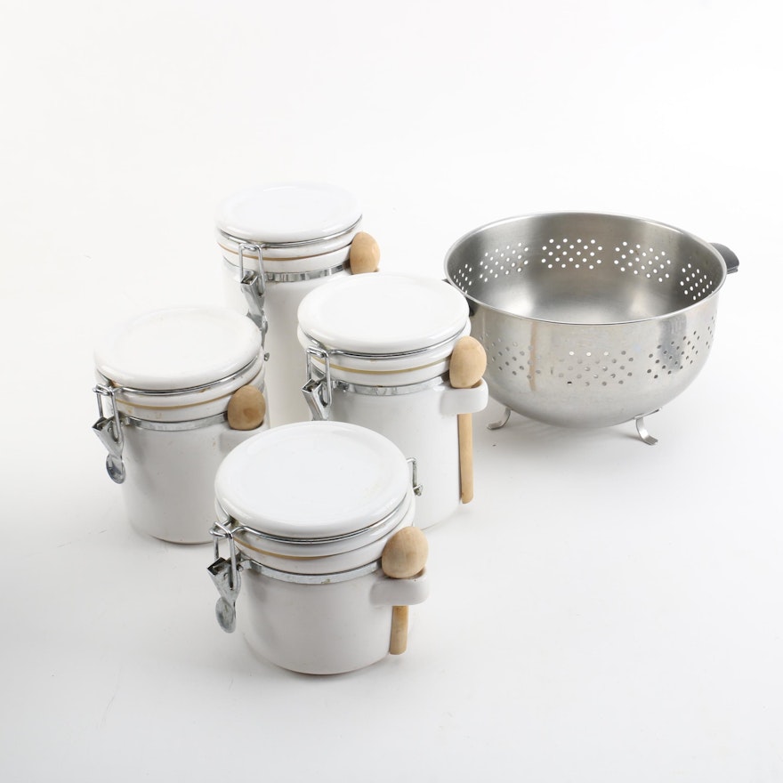 Metal Colander and Ceramic Canisters with Wooden Spoons