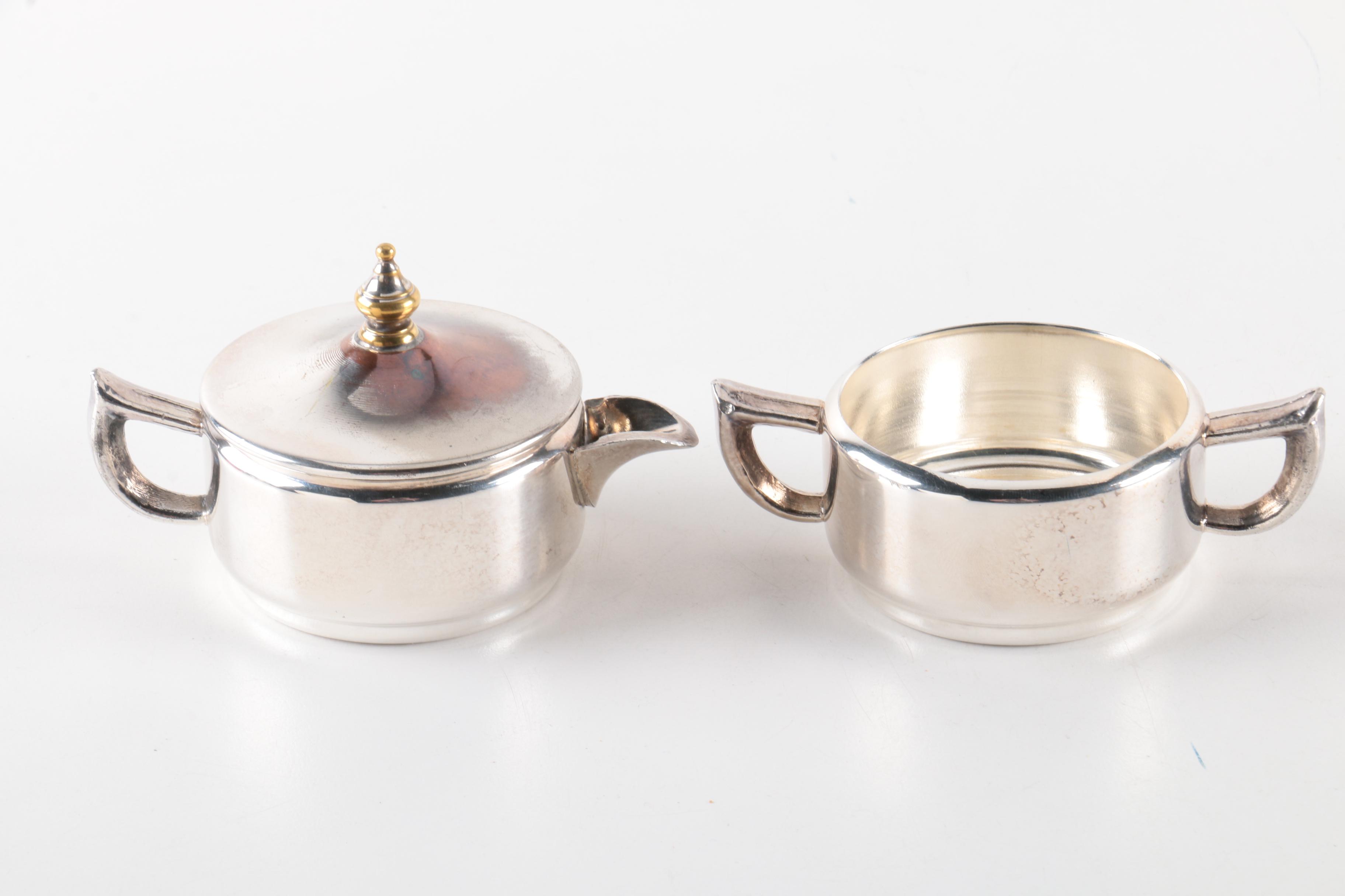 Silver Plate Coffee Pots and Cream and Sugar Bowls