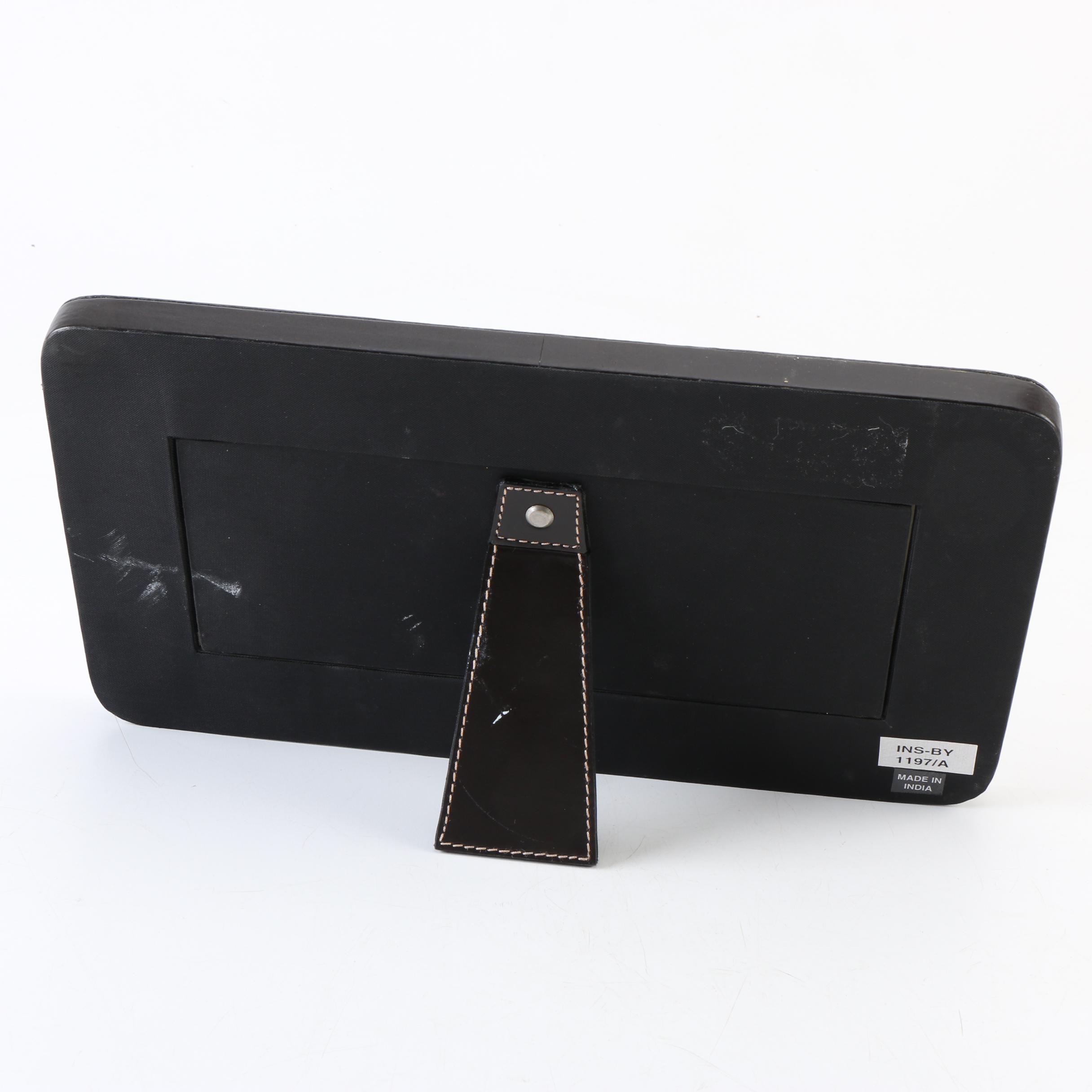 Two Magazine Racks, a Picture Frame, and an Ottoman