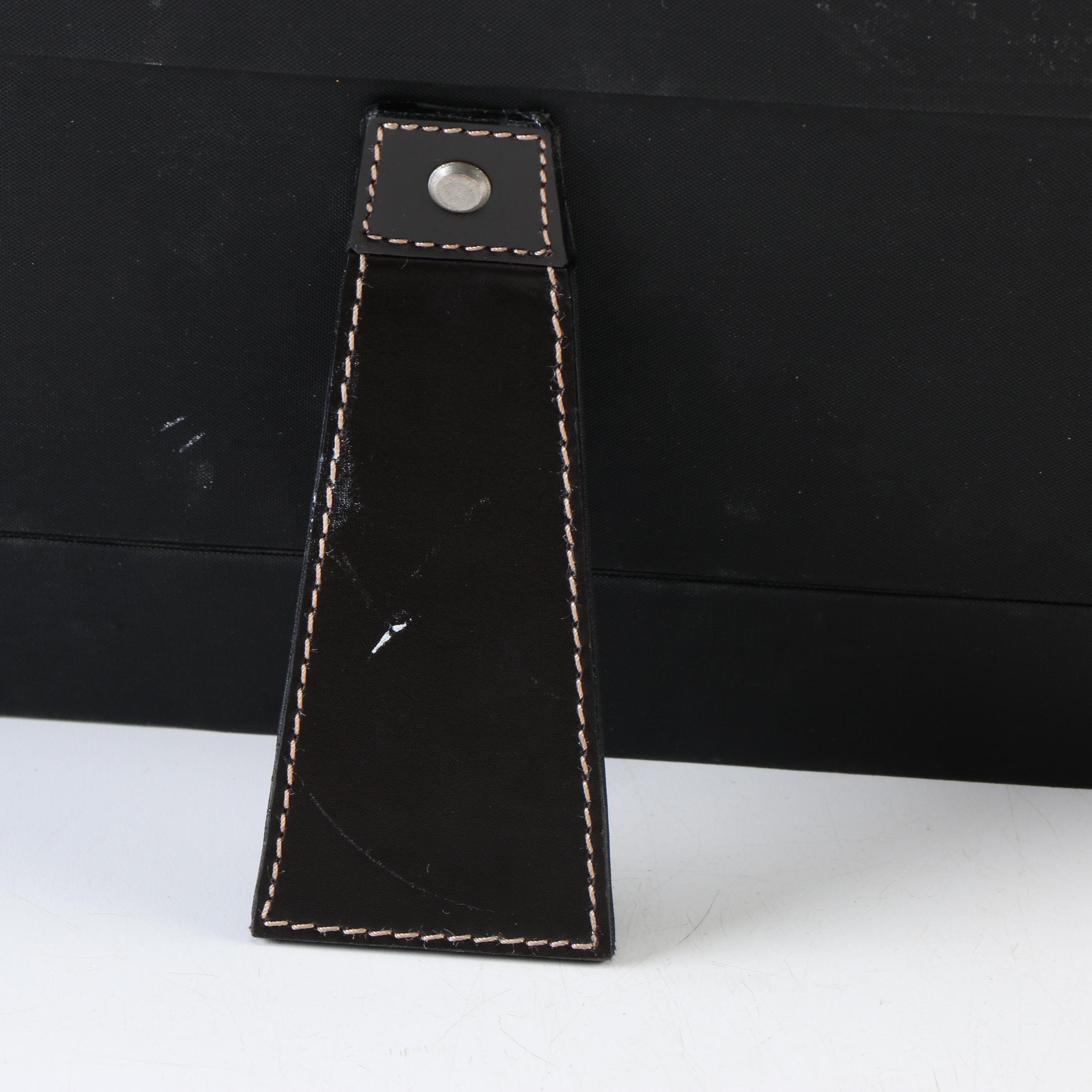 Two Magazine Racks, a Picture Frame, and an Ottoman