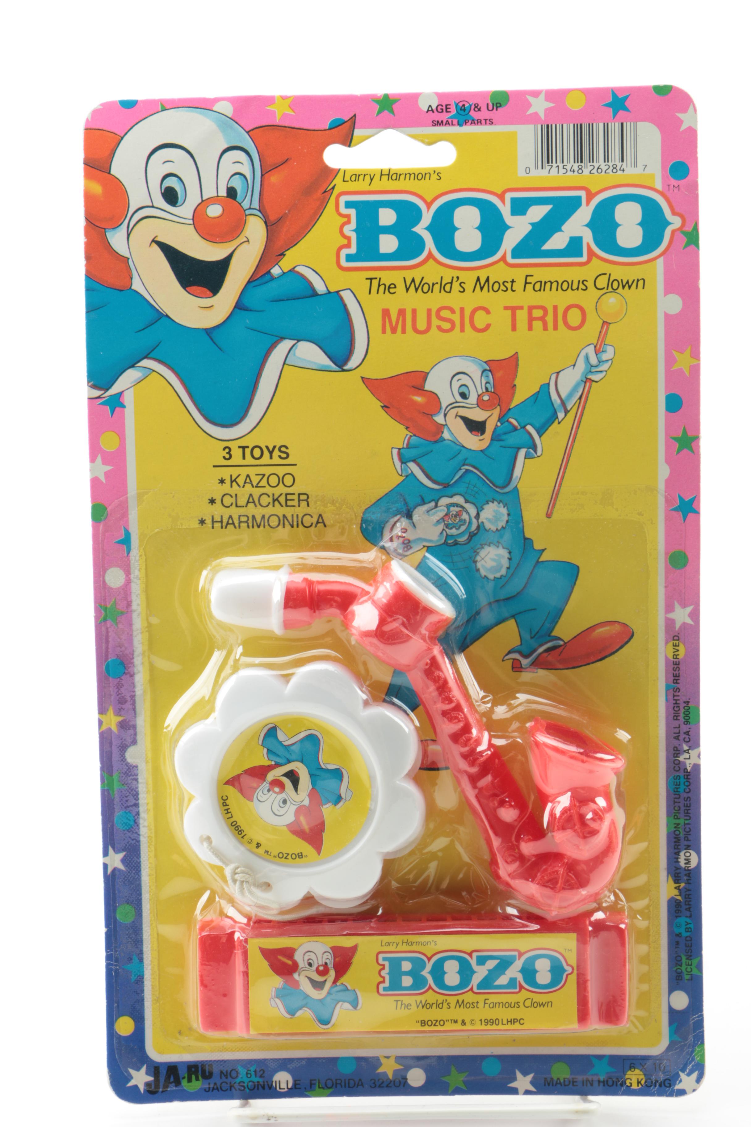 Clown Themed Books, Tamborine and Noise Makers With "Bozo" 45 rpm Record