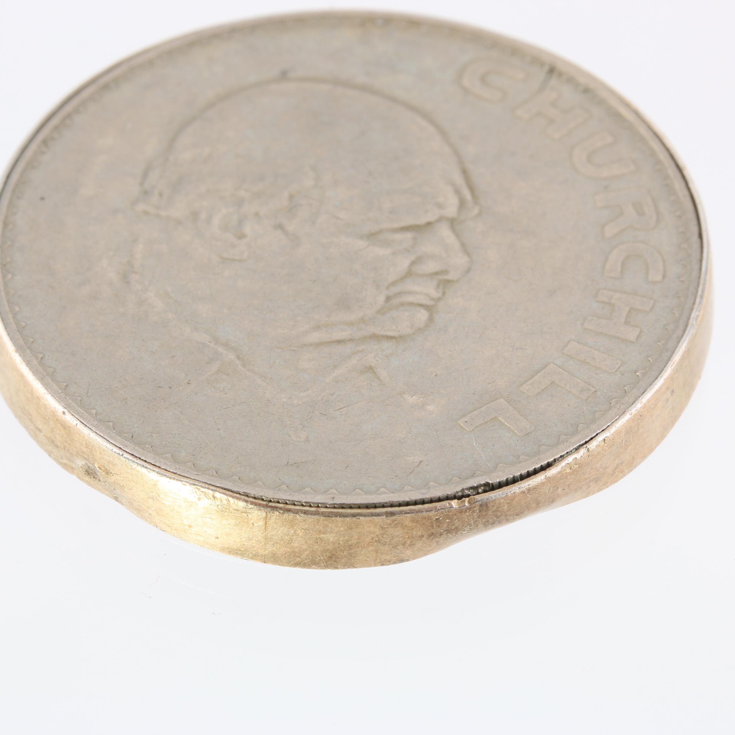 1965 United Kingdom One Crown Coin and a 1965 Mexico Fifty Centavos Coin