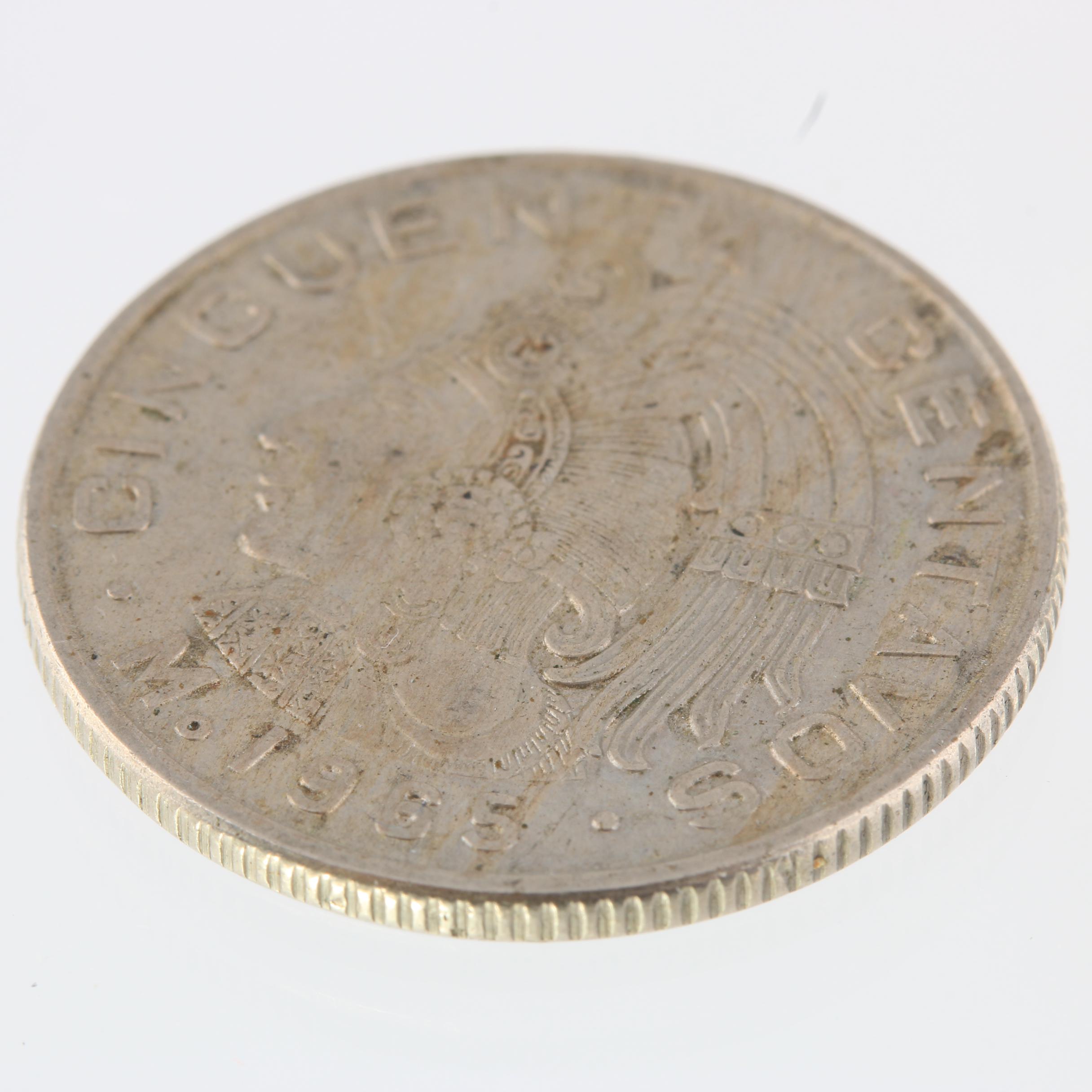 1965 United Kingdom One Crown Coin and a 1965 Mexico Fifty Centavos Coin