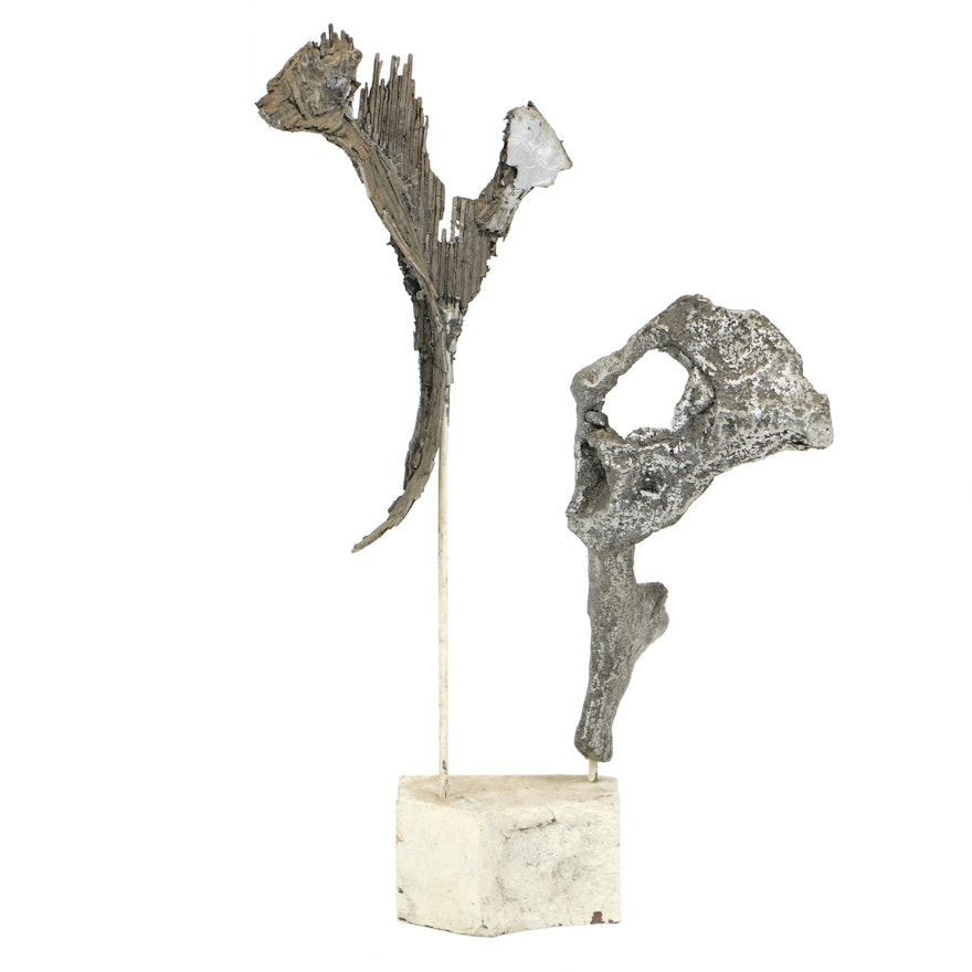 Abstract Metal Sculpture on Stone Base