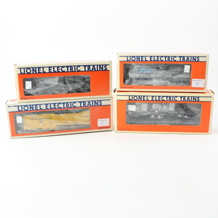 Lionel Train Cars Including Flat Car with Tractors