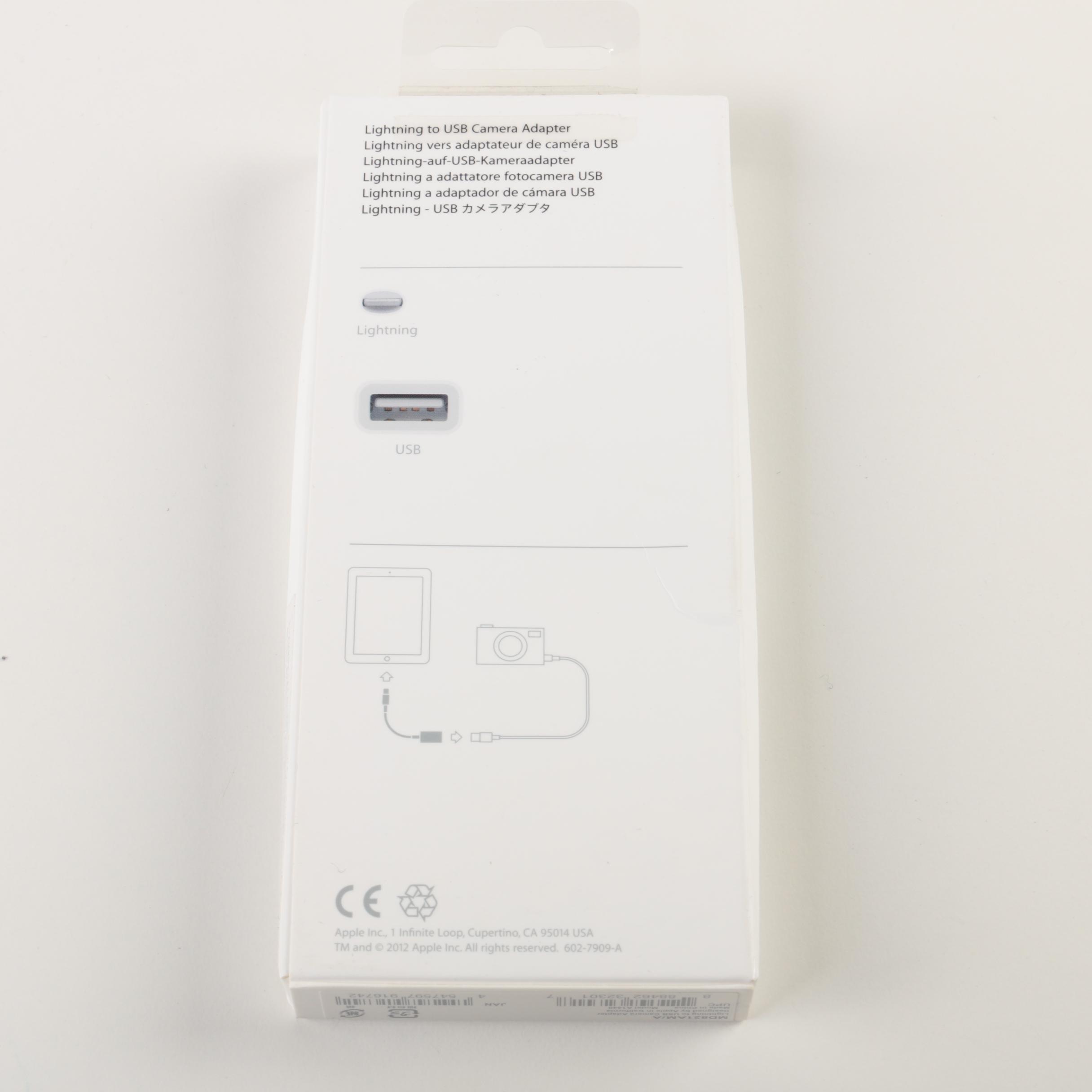 16GB Sixth Generation Apple iPod Touch with Lightning to USB Camera Adapter