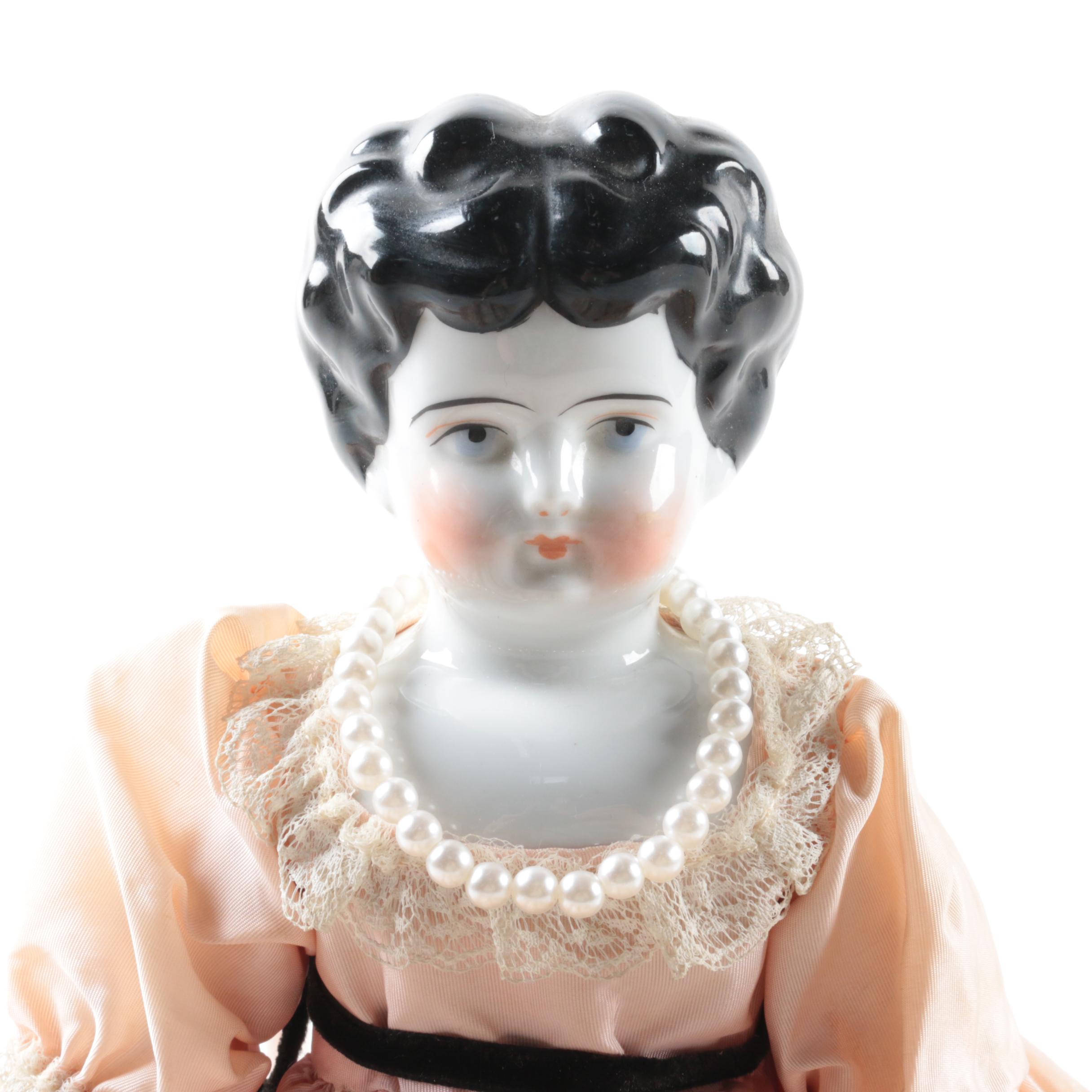 Vintage China Head Doll in Peach Dress
