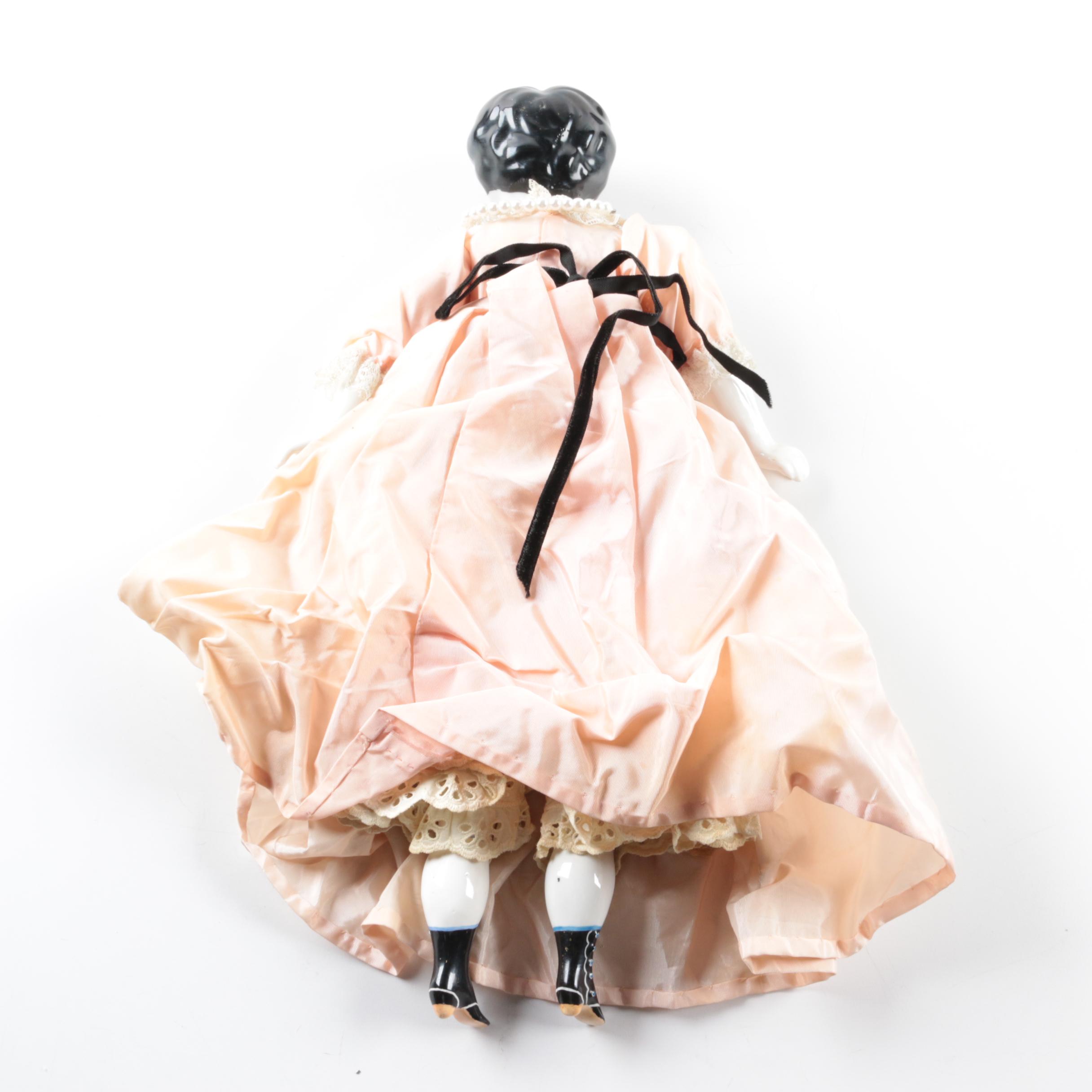 Vintage China Head Doll in Peach Dress