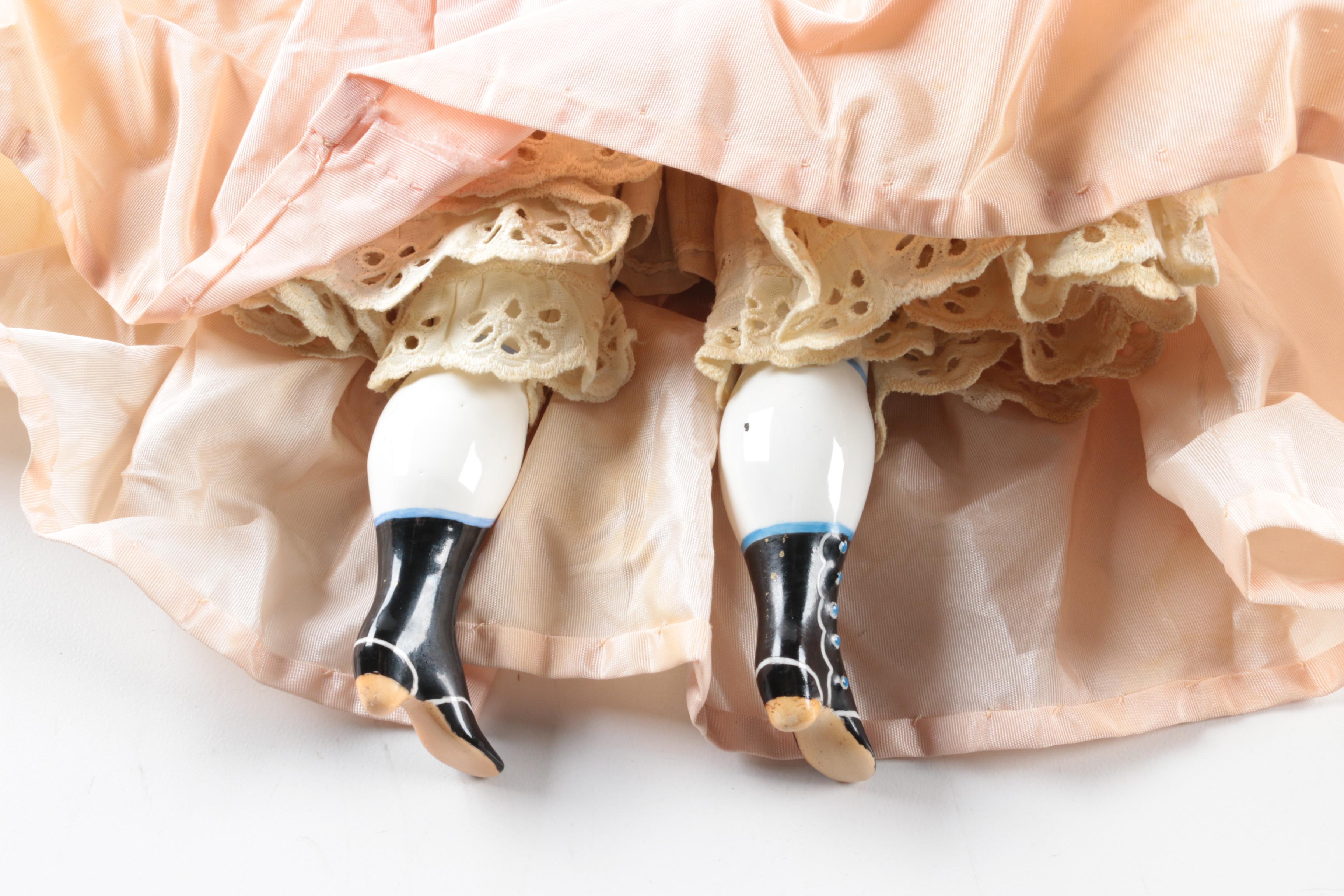 Vintage China Head Doll in Peach Dress