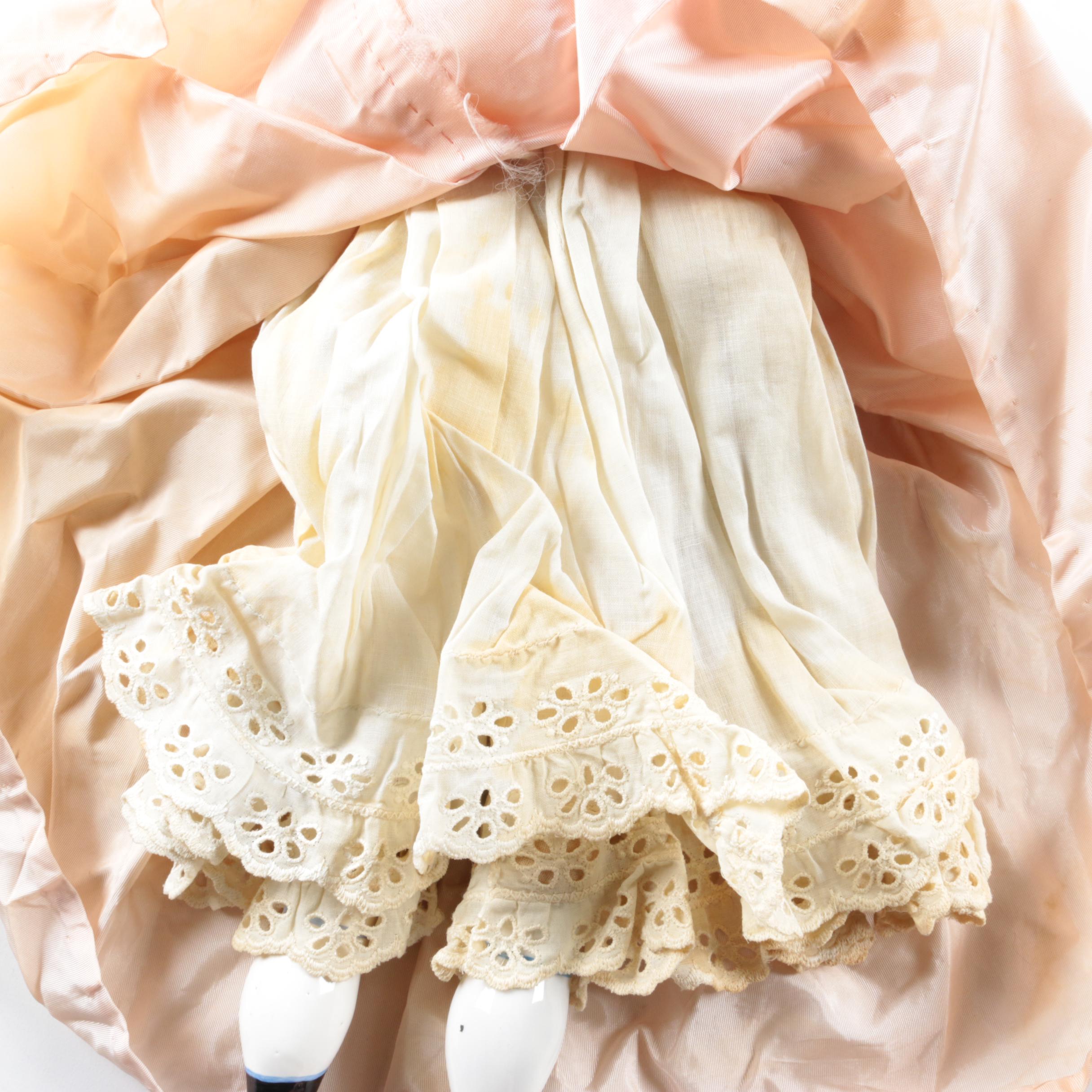 Vintage China Head Doll in Peach Dress