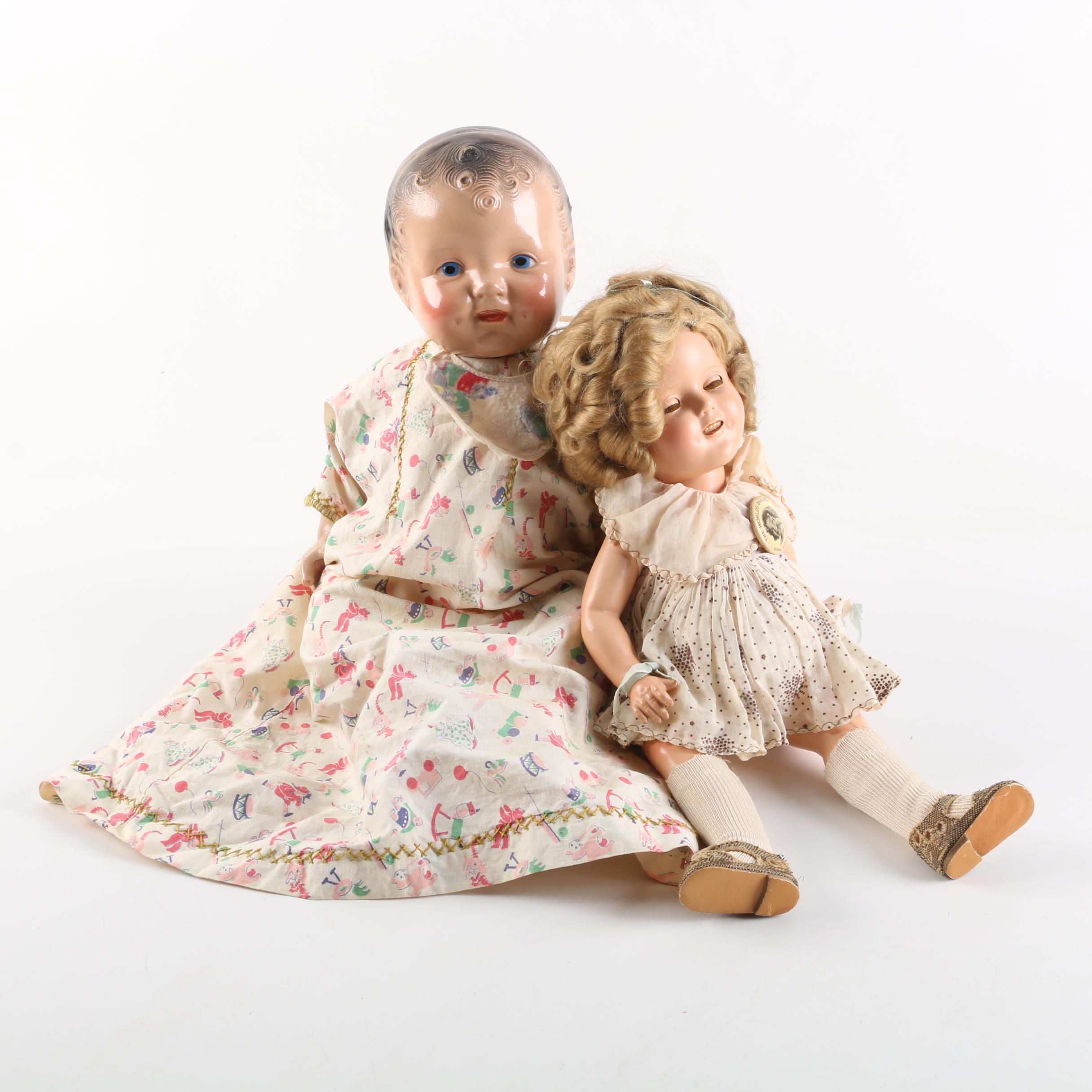 Circa 1930s Ideal "Shirley Temple" Doll and Composition Baby Doll