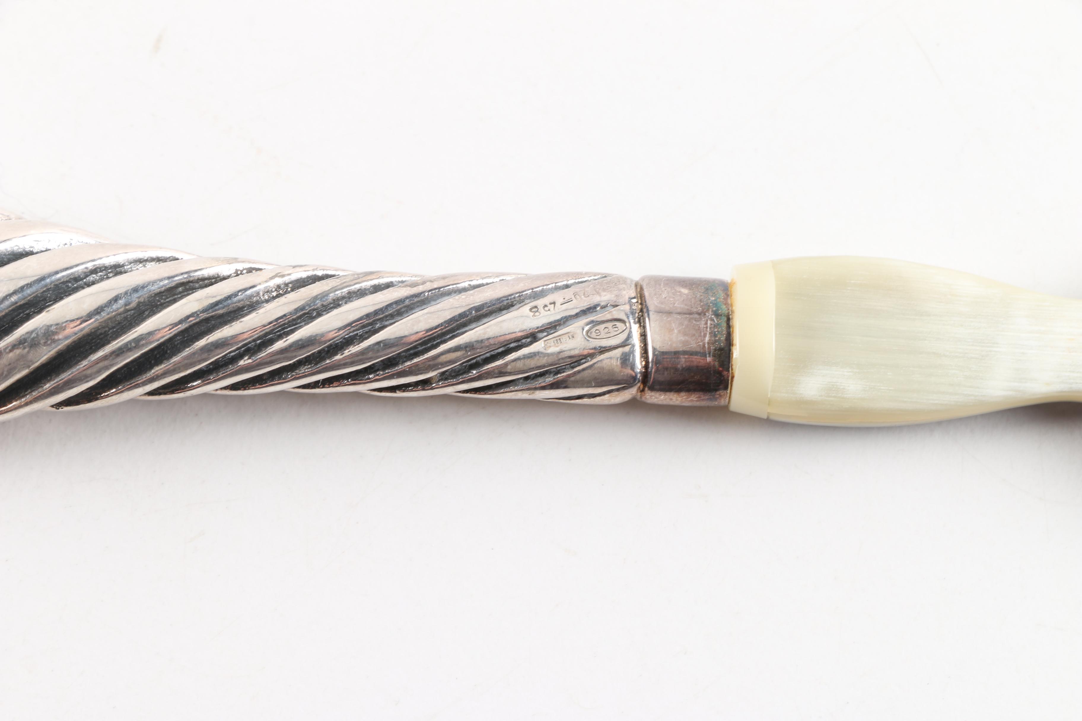 Horn and Silver Accented Tableware