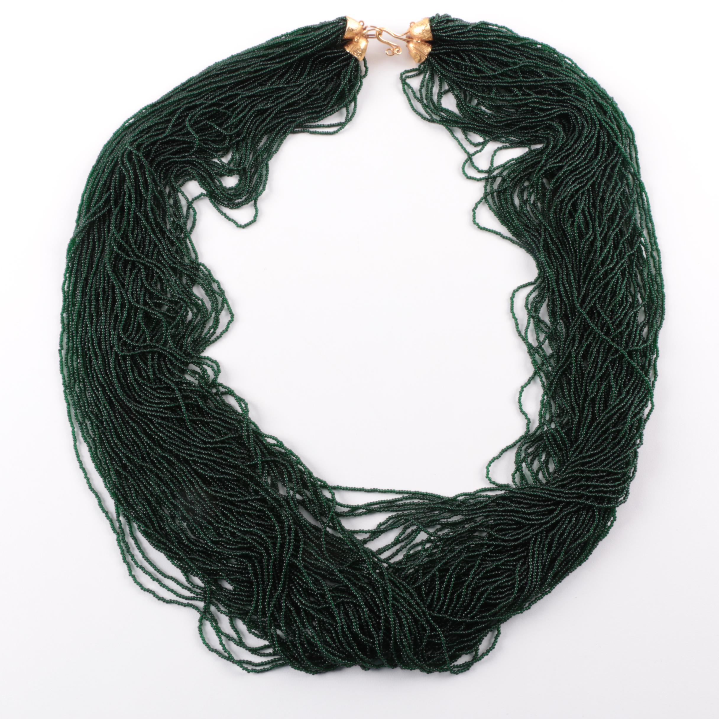 Assortment of Gold Tone Cubic Zirconia, Resin, Leather and Wood Jewelry