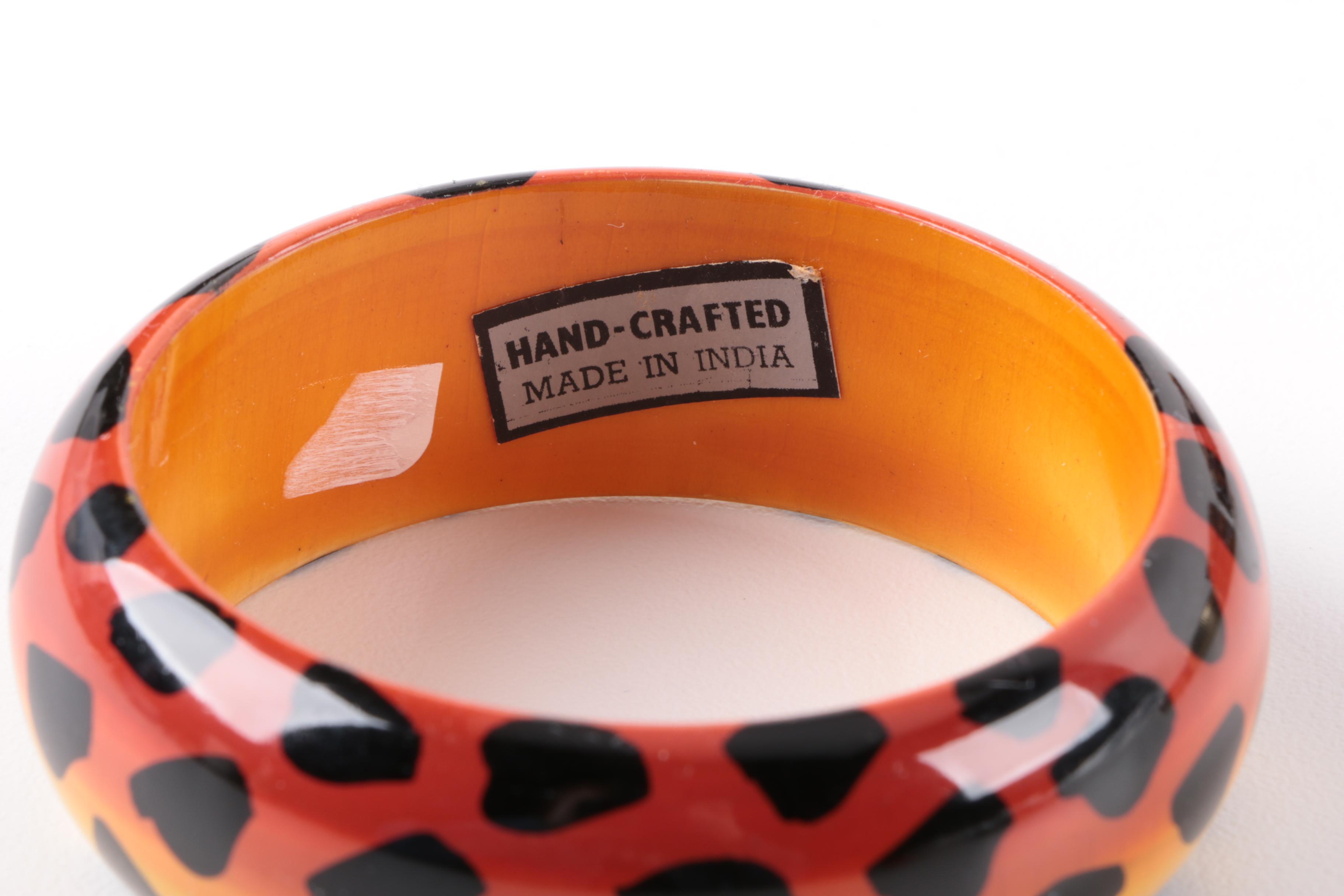 Assortment of Gold Tone Cubic Zirconia, Resin, Leather and Wood Jewelry