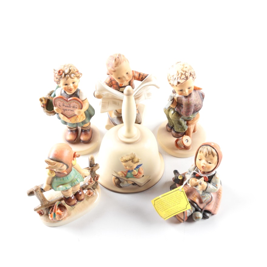 Group of Six Hummel Figurines Including a Handbell With Boxes
