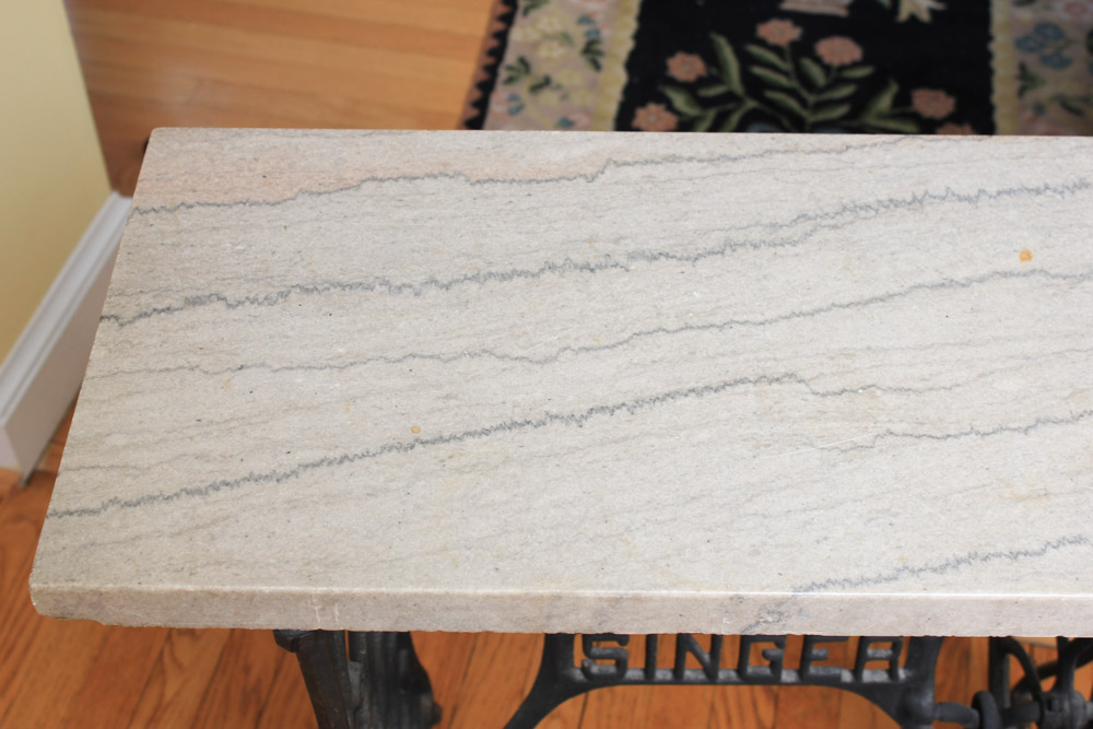 Stone-Top Table With Singer Sewing Machine Base