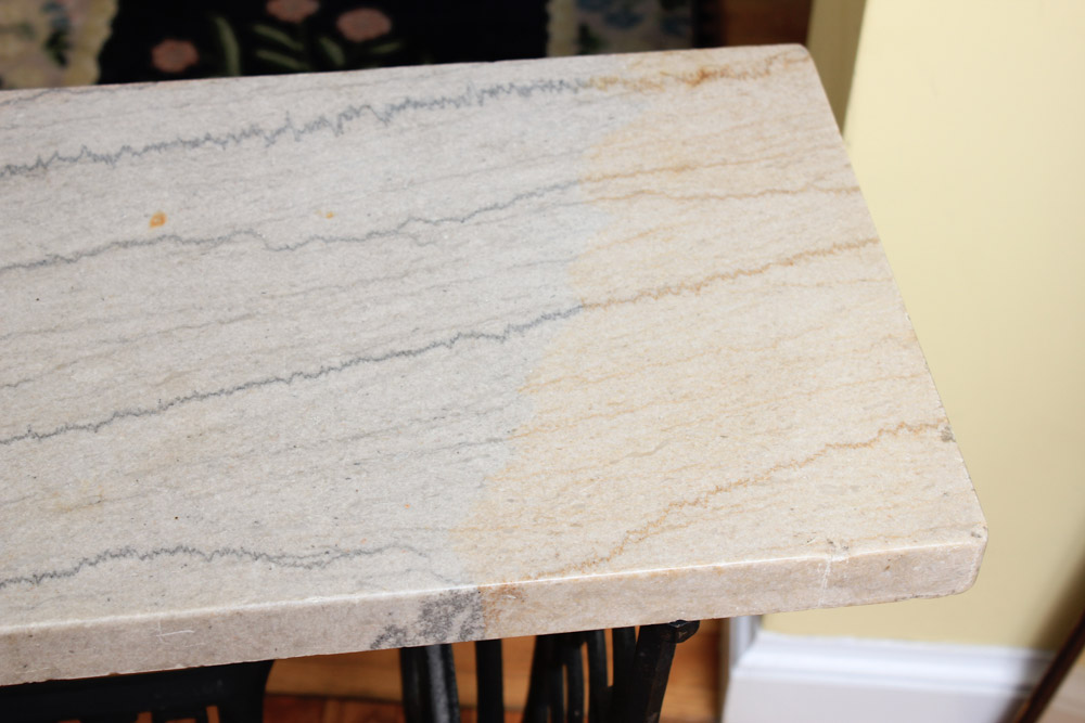Stone-Top Table With Singer Sewing Machine Base