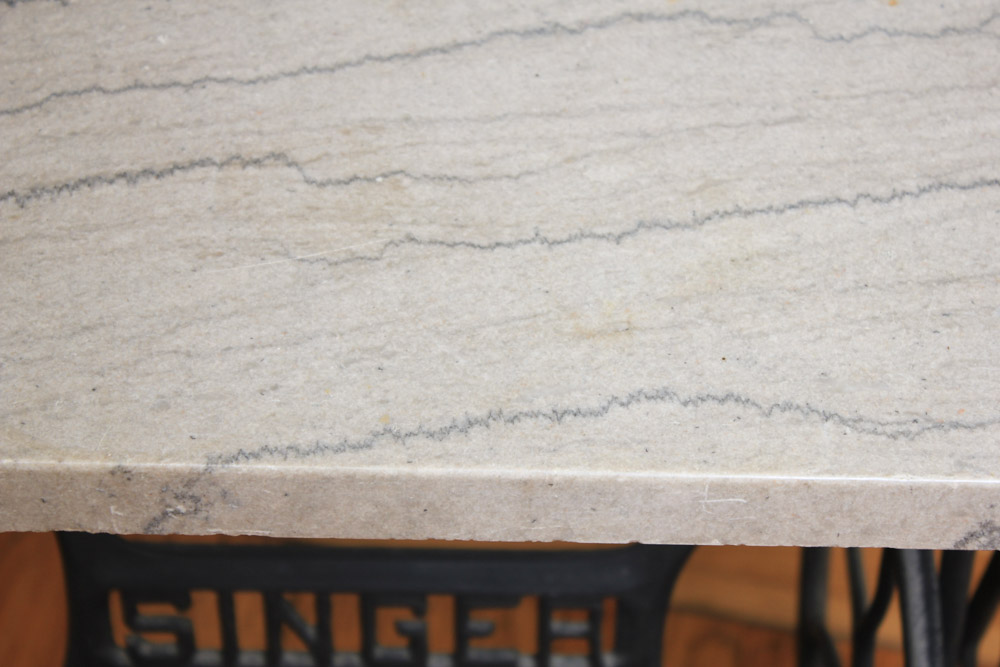 Stone-Top Table With Singer Sewing Machine Base