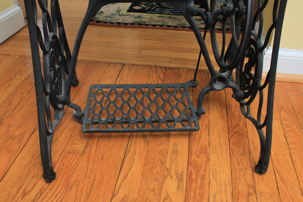 Stone-Top Table With Singer Sewing Machine Base