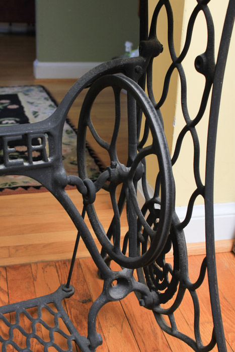 Stone-Top Table With Singer Sewing Machine Base