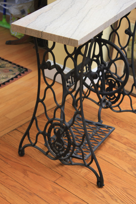 Stone-Top Table With Singer Sewing Machine Base