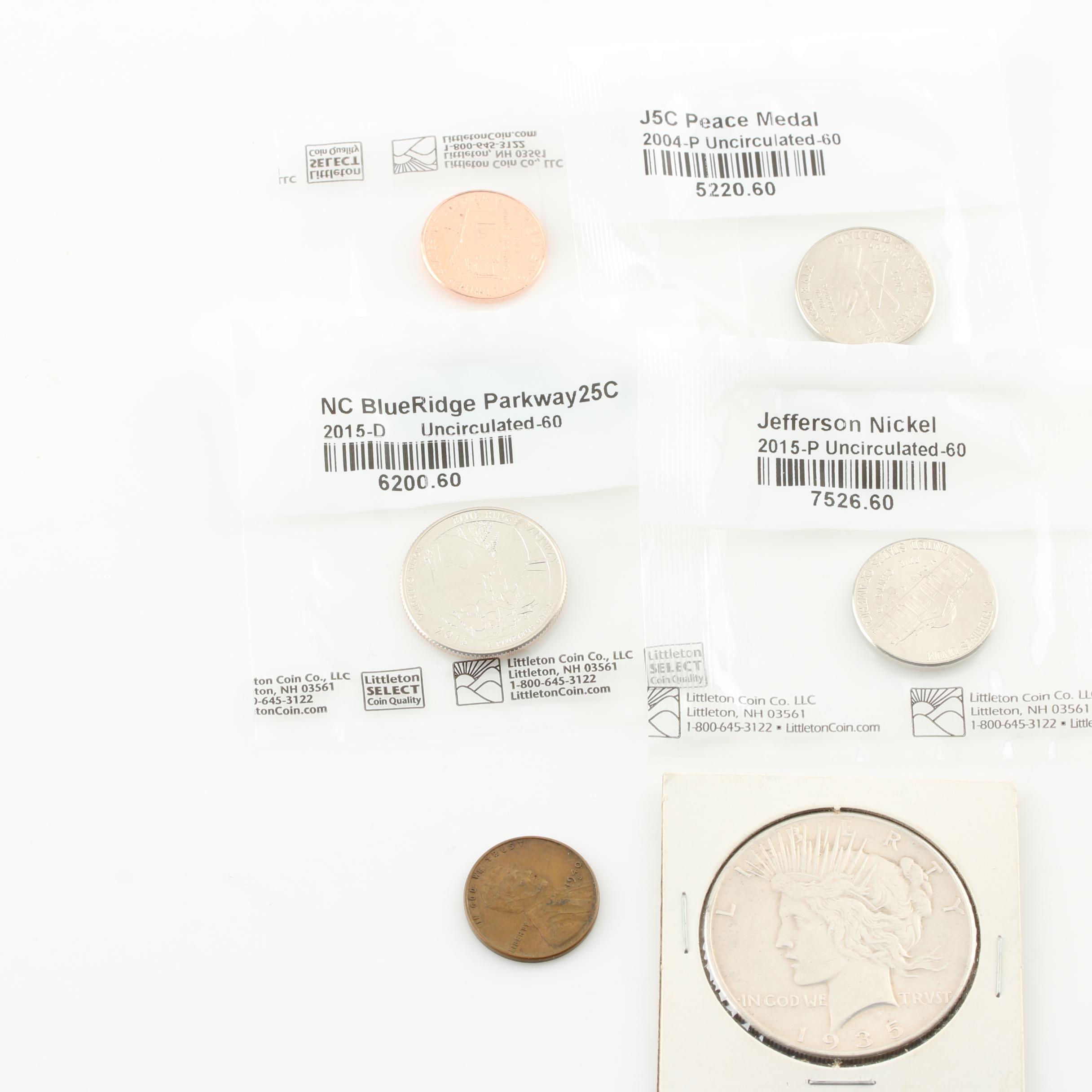1935 Peace Silver Dollar and an Assortment of U.S. Coins