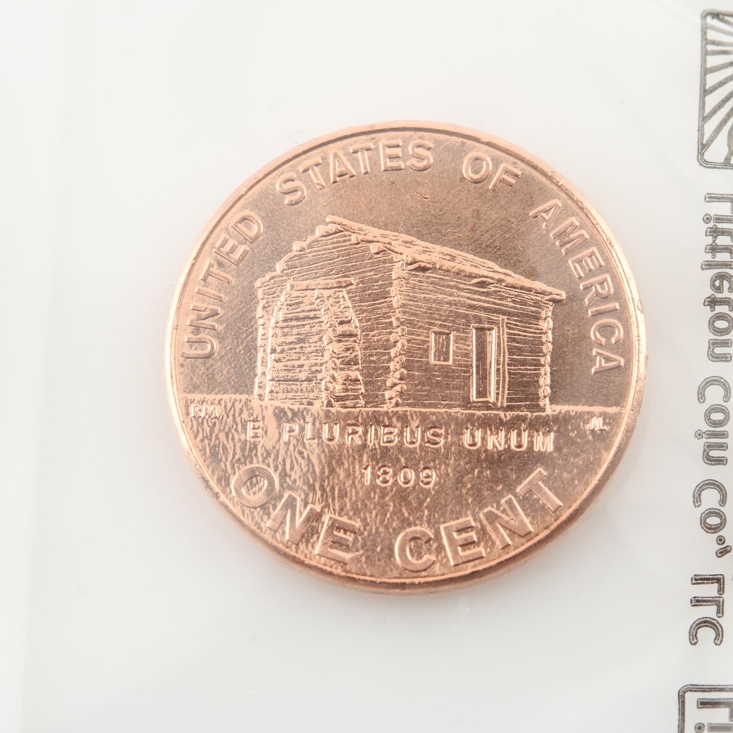 1935 Peace Silver Dollar and an Assortment of U.S. Coins