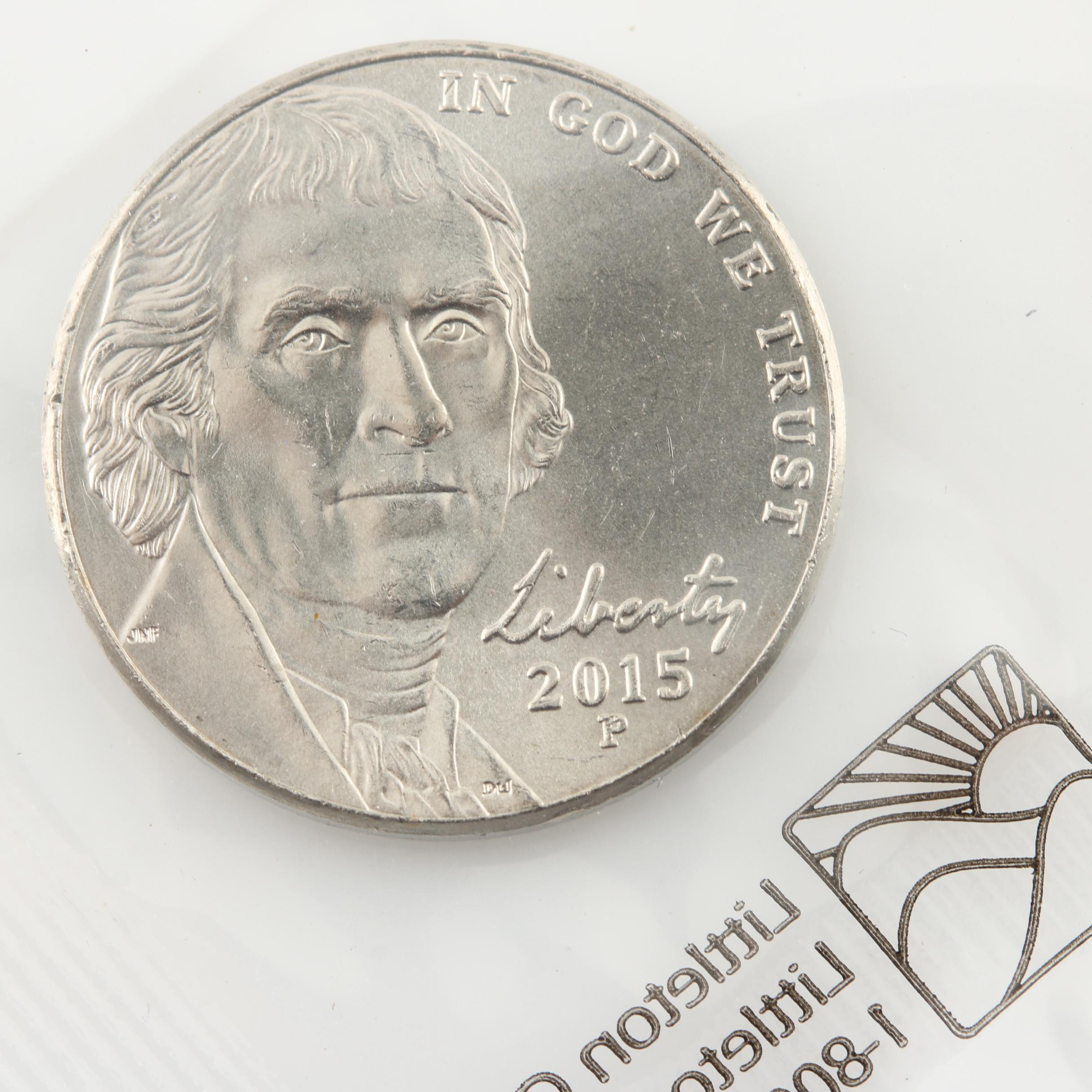 1935 Peace Silver Dollar and an Assortment of U.S. Coins