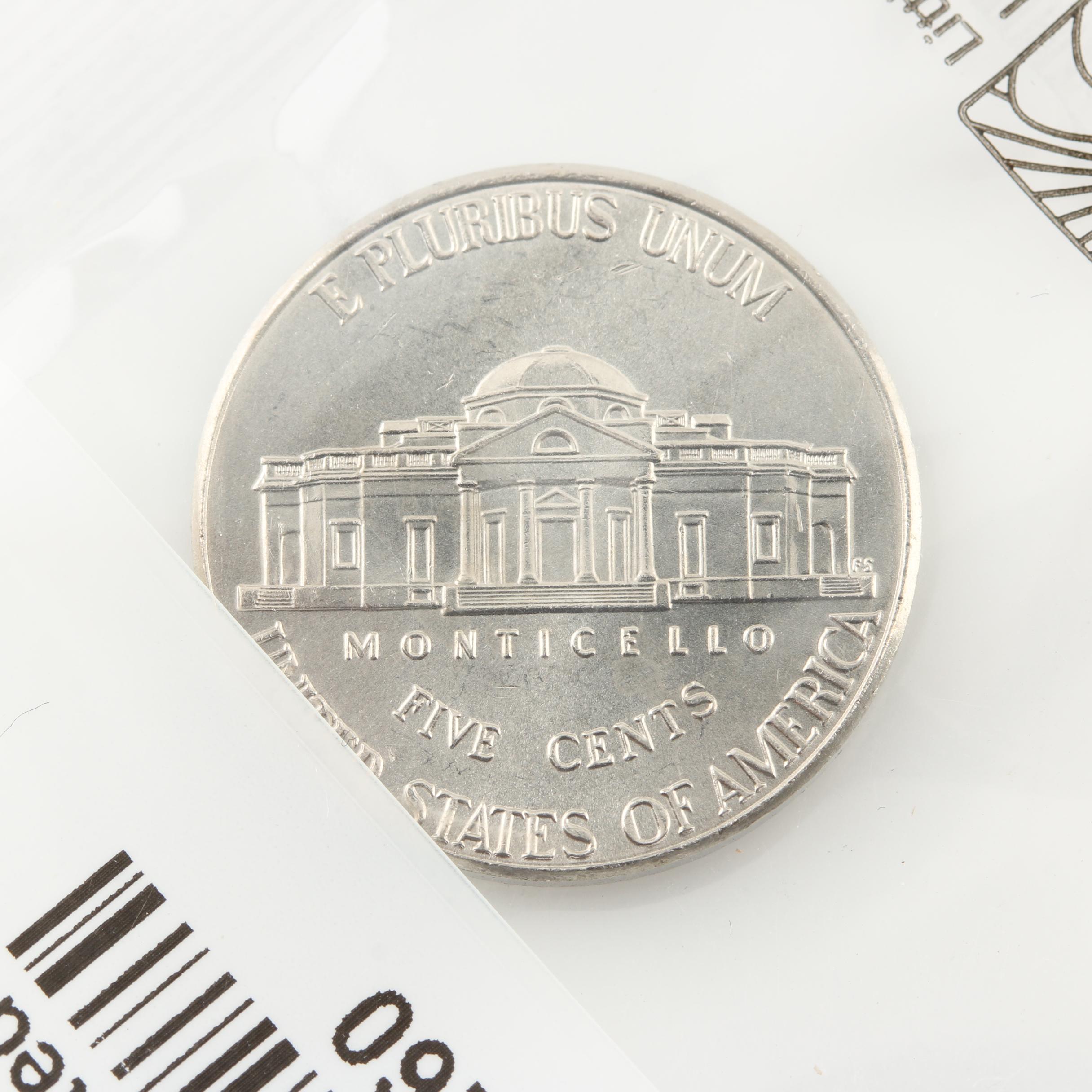 1935 Peace Silver Dollar and an Assortment of U.S. Coins