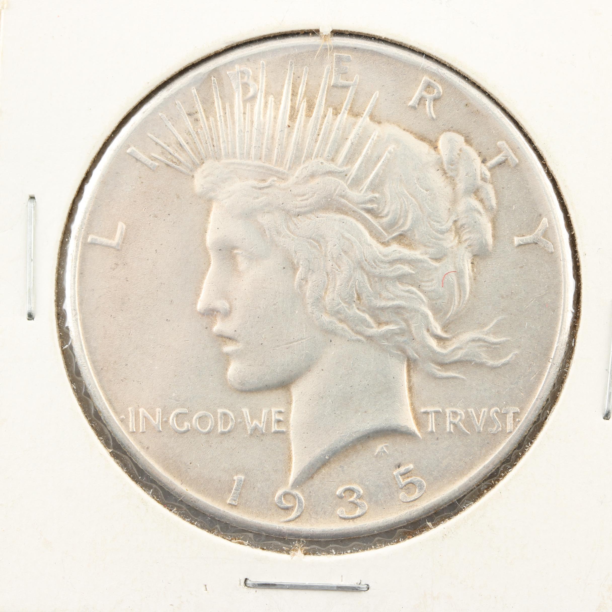 1935 Peace Silver Dollar and an Assortment of U.S. Coins