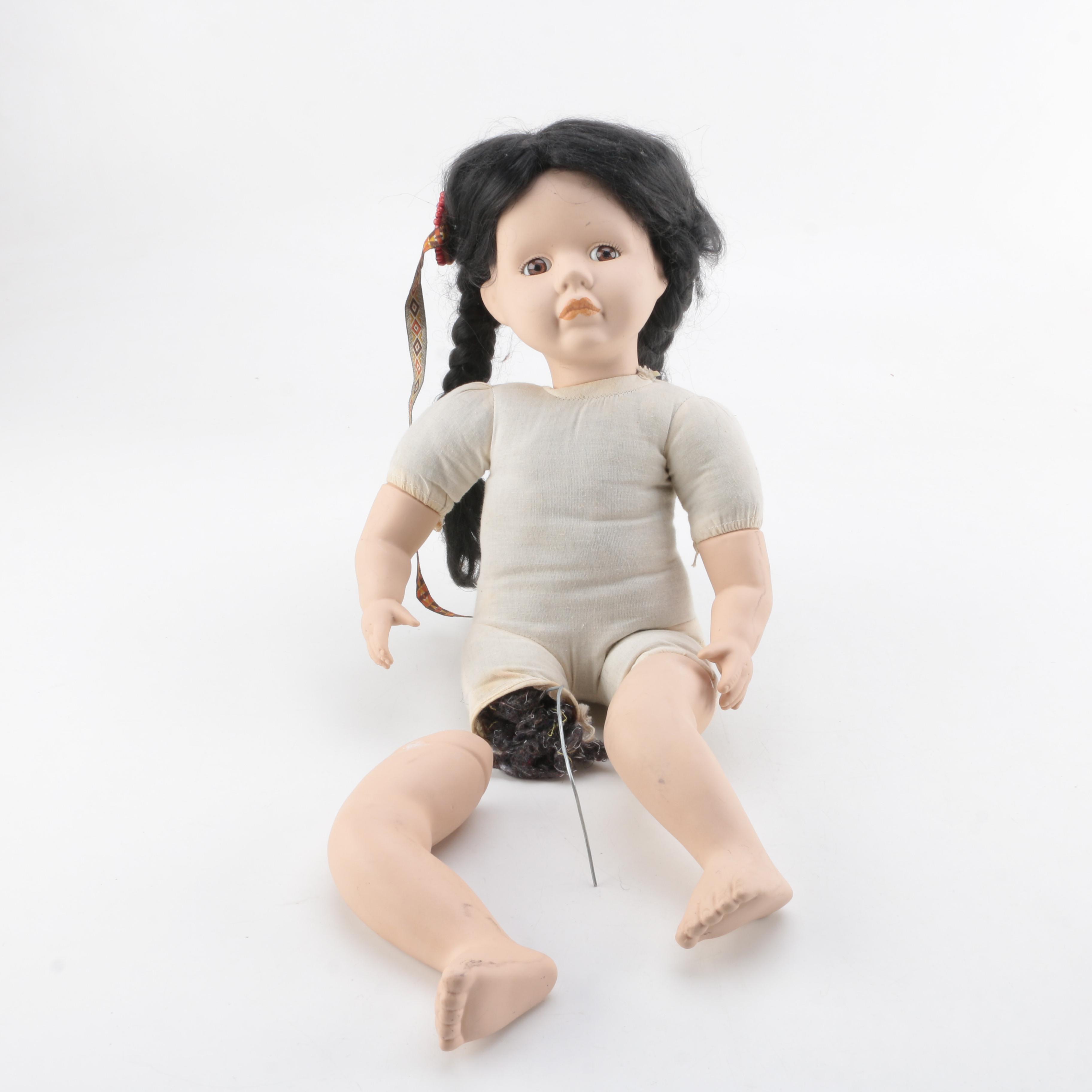 Vintage Porcelain Doll with Raven Braids