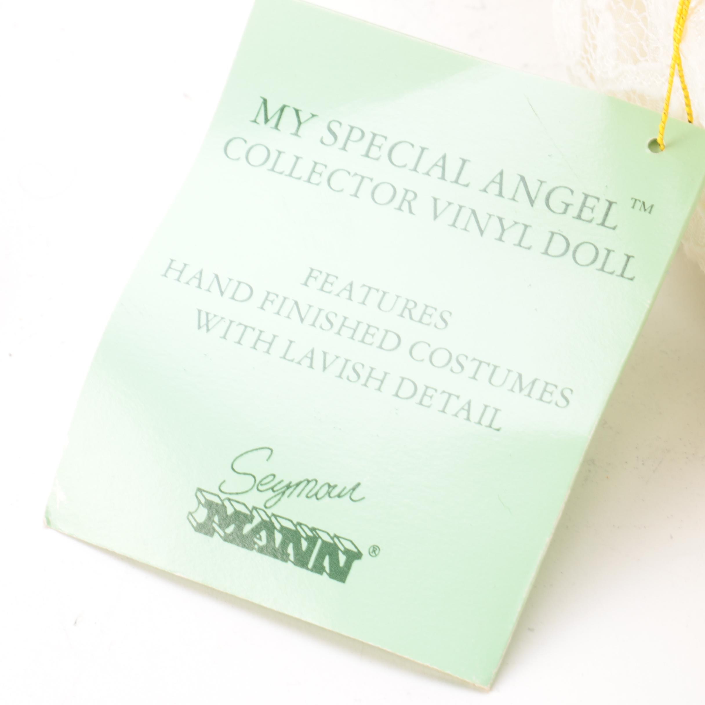 Seymour Mann "My Special Angel" Vinyl Doll with Vintage Porcelain Doll